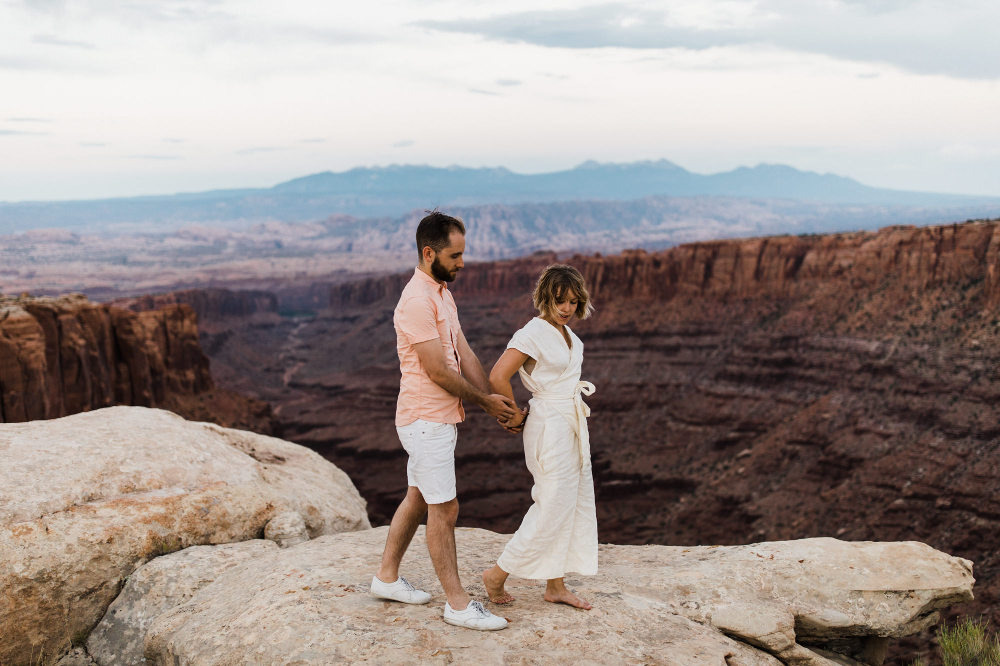 moab, utah adventurous elopement | utah intimate wedding photographer | jumpsuit bride | desert wedding inspiration | the hearnes adventure photography