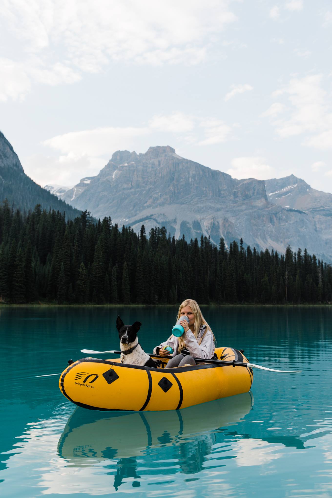 traveling photographers exploring lakes and mountains in canada