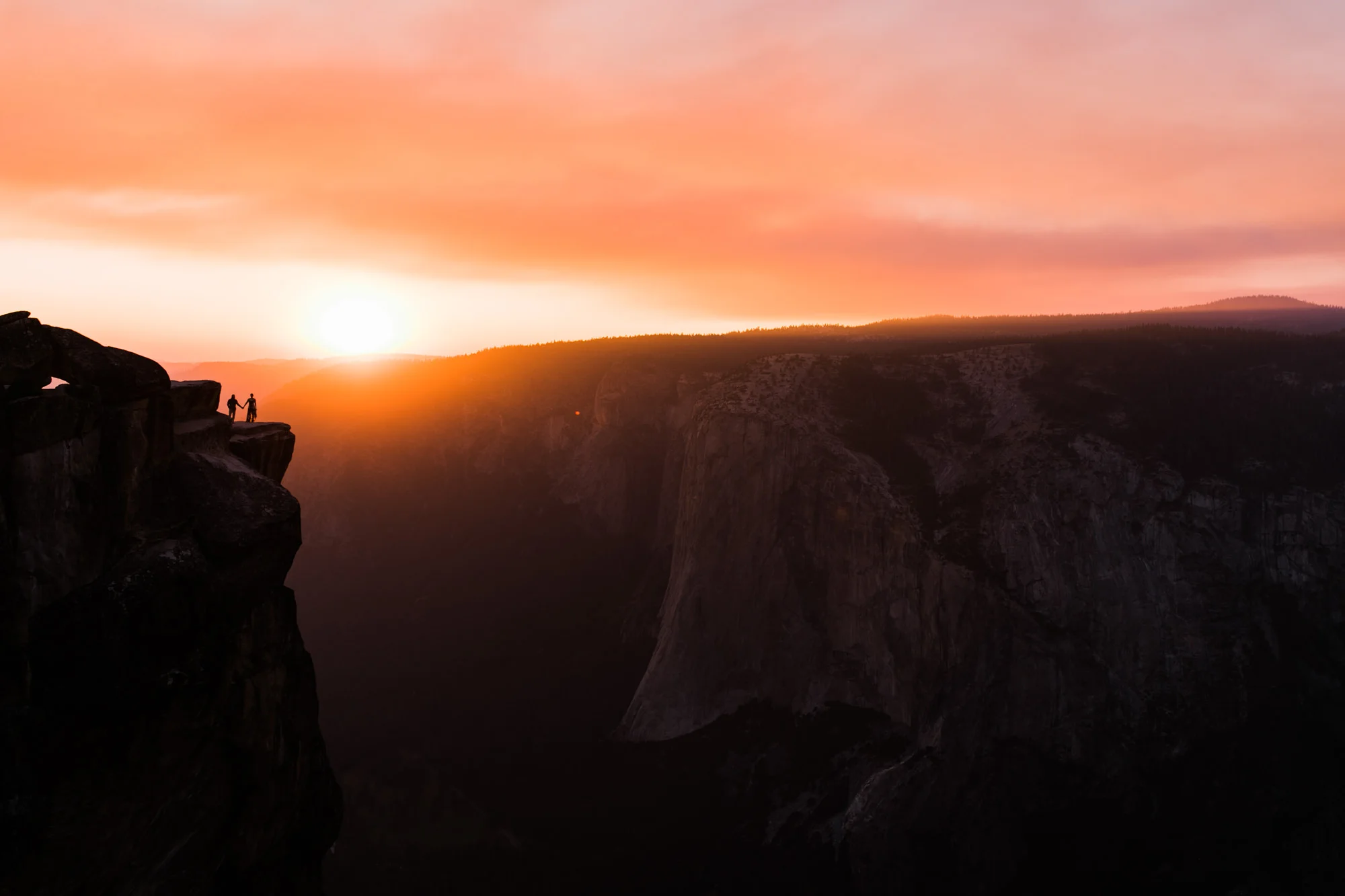 stephany + anthony's adventurous engagement session | taft point, yosemite national park | destination elopement photographer | the hearnes adventure photography | www.thehearnes.com