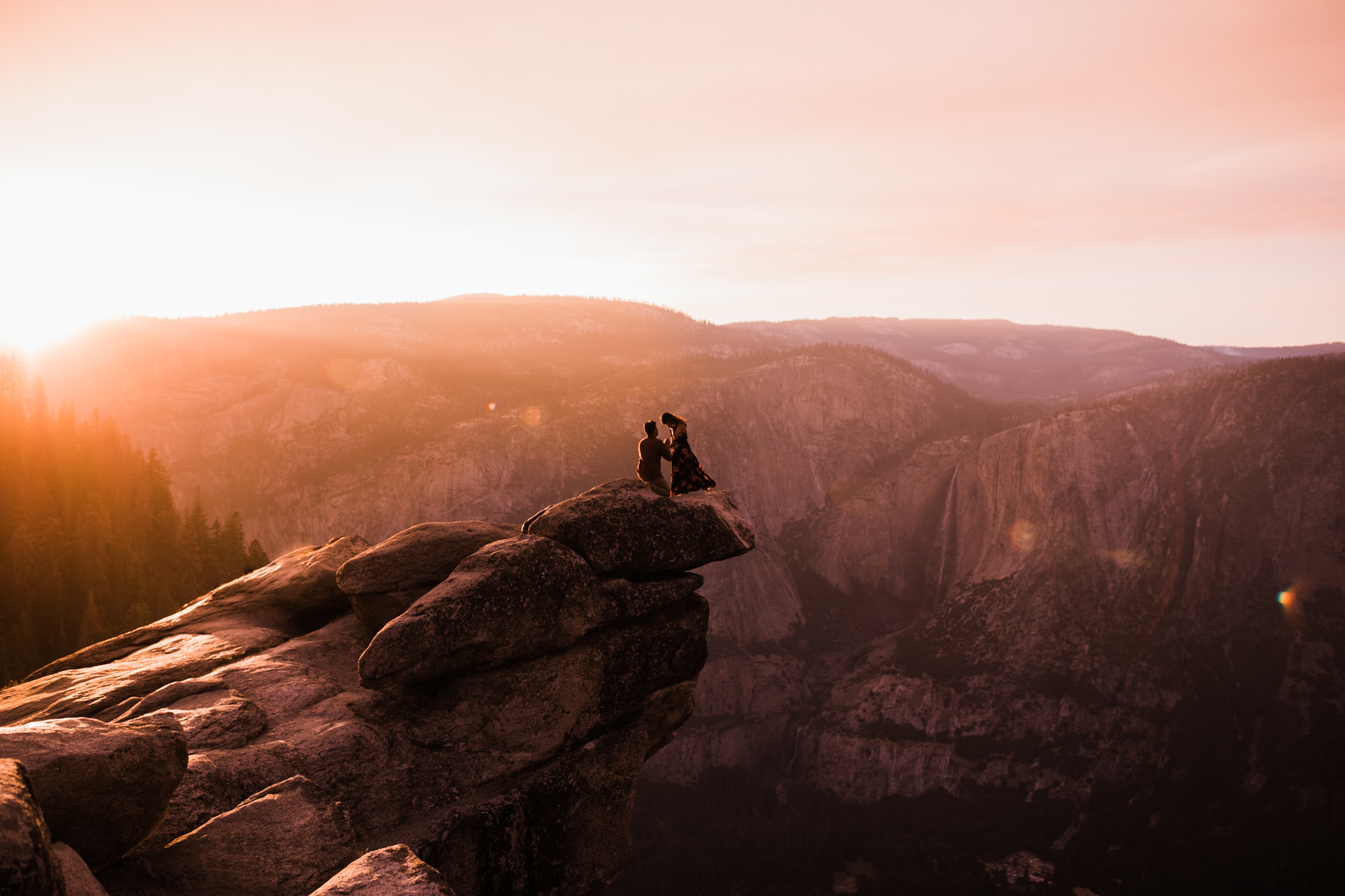 dreema + jay's adventurous engagement session + surprise proposal | yosemite valley + glacier point, yosemite national park | destination elopement photographer | www.thehearnes.com