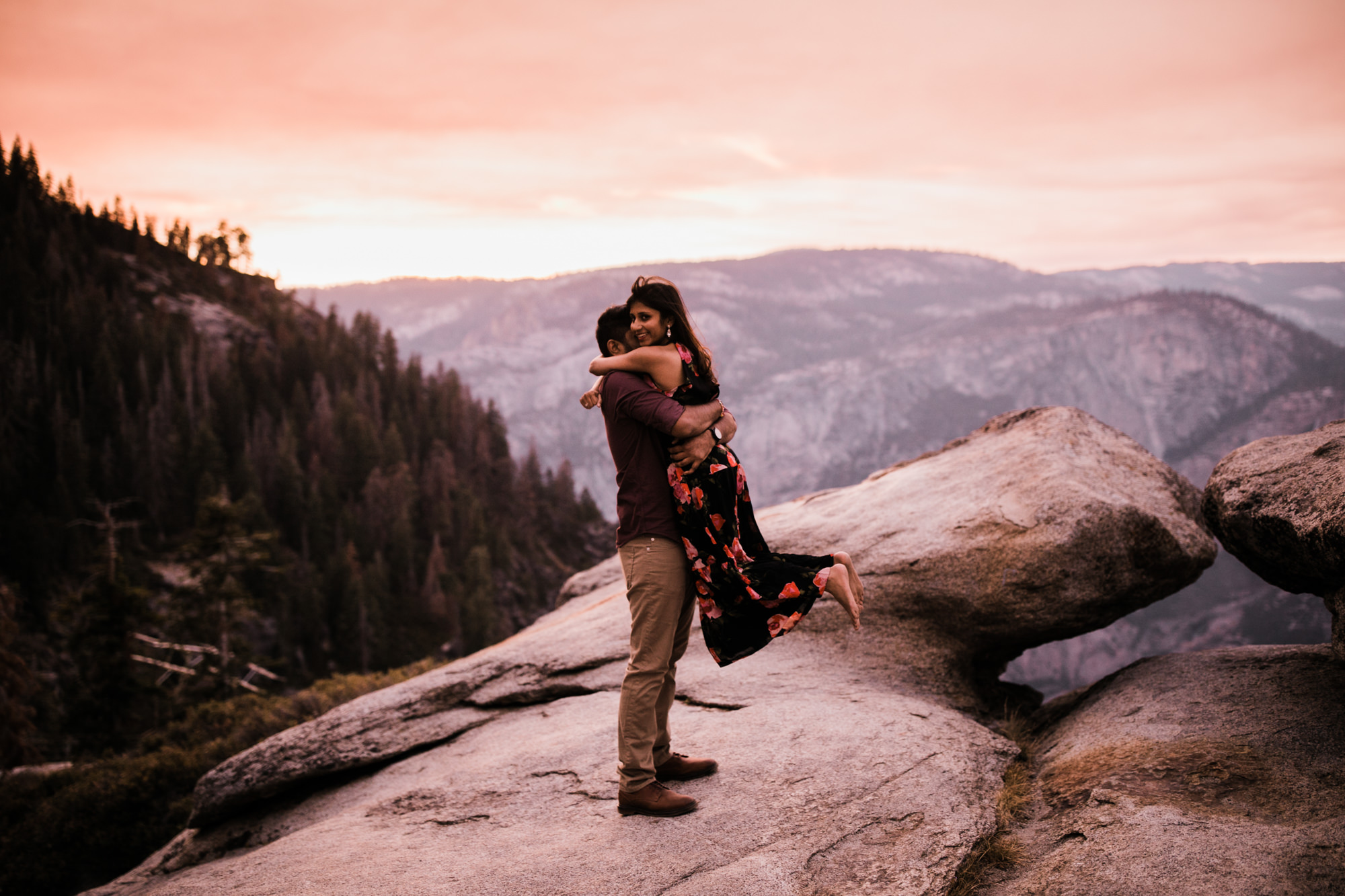 dreema + jay's adventurous engagement session + surprise proposal | yosemite valley + glacier point, yosemite national park | destination elopement photographer | www.thehearnes.com