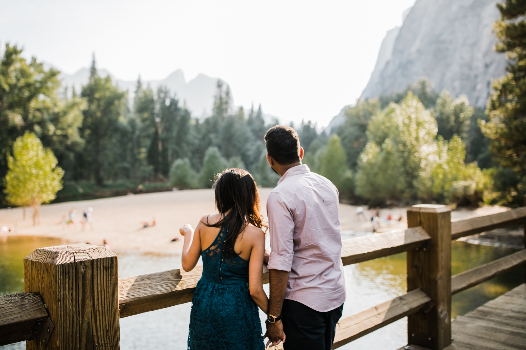 dreema + jay's adventurous engagement session + surprise proposal | yosemite valley + glacier point, yosemite national park | destination elopement photographer | www.thehearnes.com