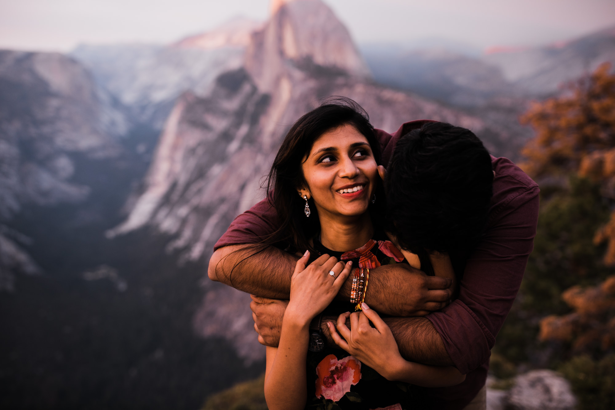 dreema + jay's adventurous engagement session + surprise proposal | yosemite valley + glacier point, yosemite national park | destination elopement photographer | www.thehearnes.com