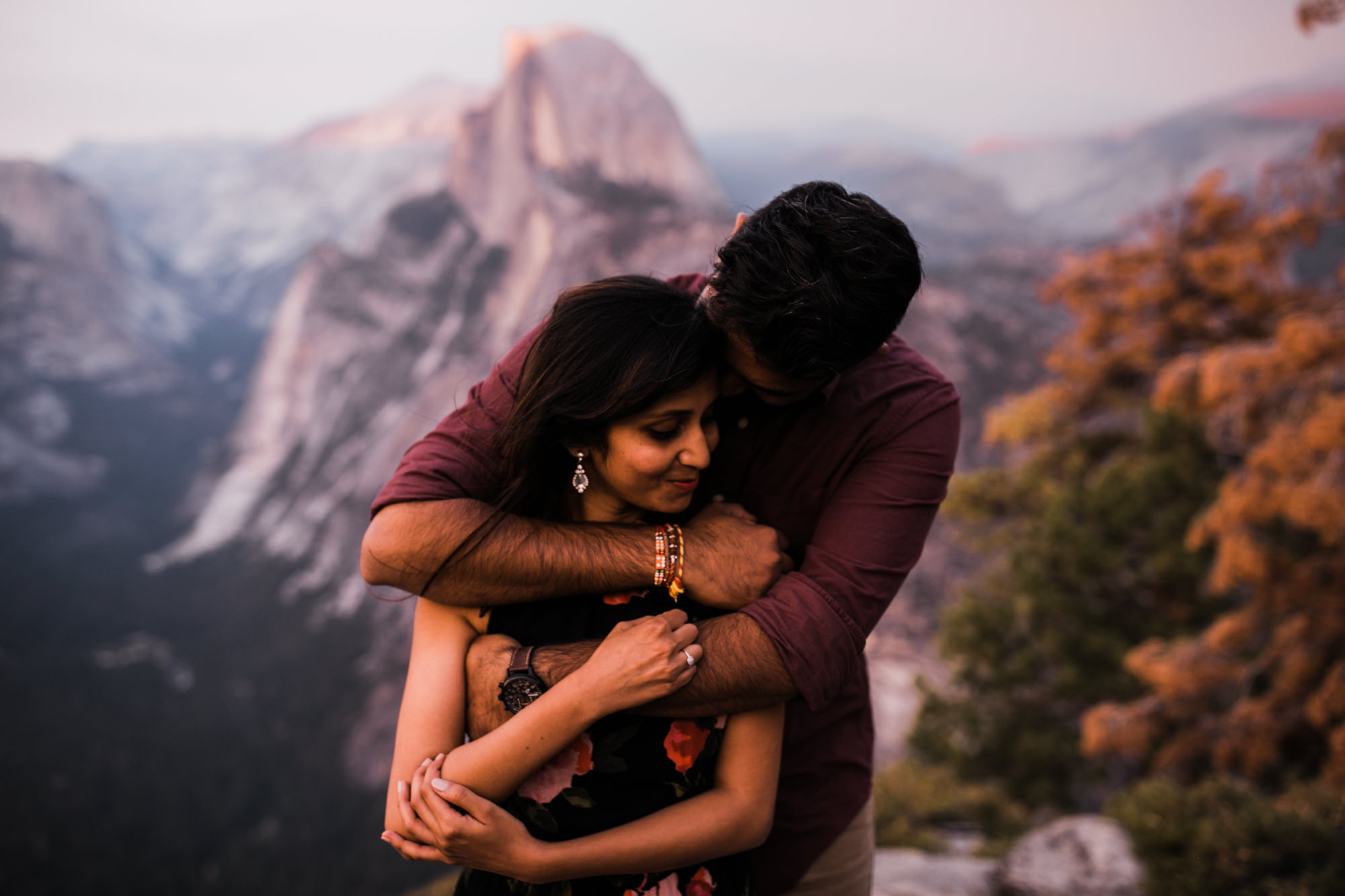 dreema + jay's adventurous engagement session + surprise proposal | yosemite valley + glacier point, yosemite national park | destination elopement photographer | www.thehearnes.com