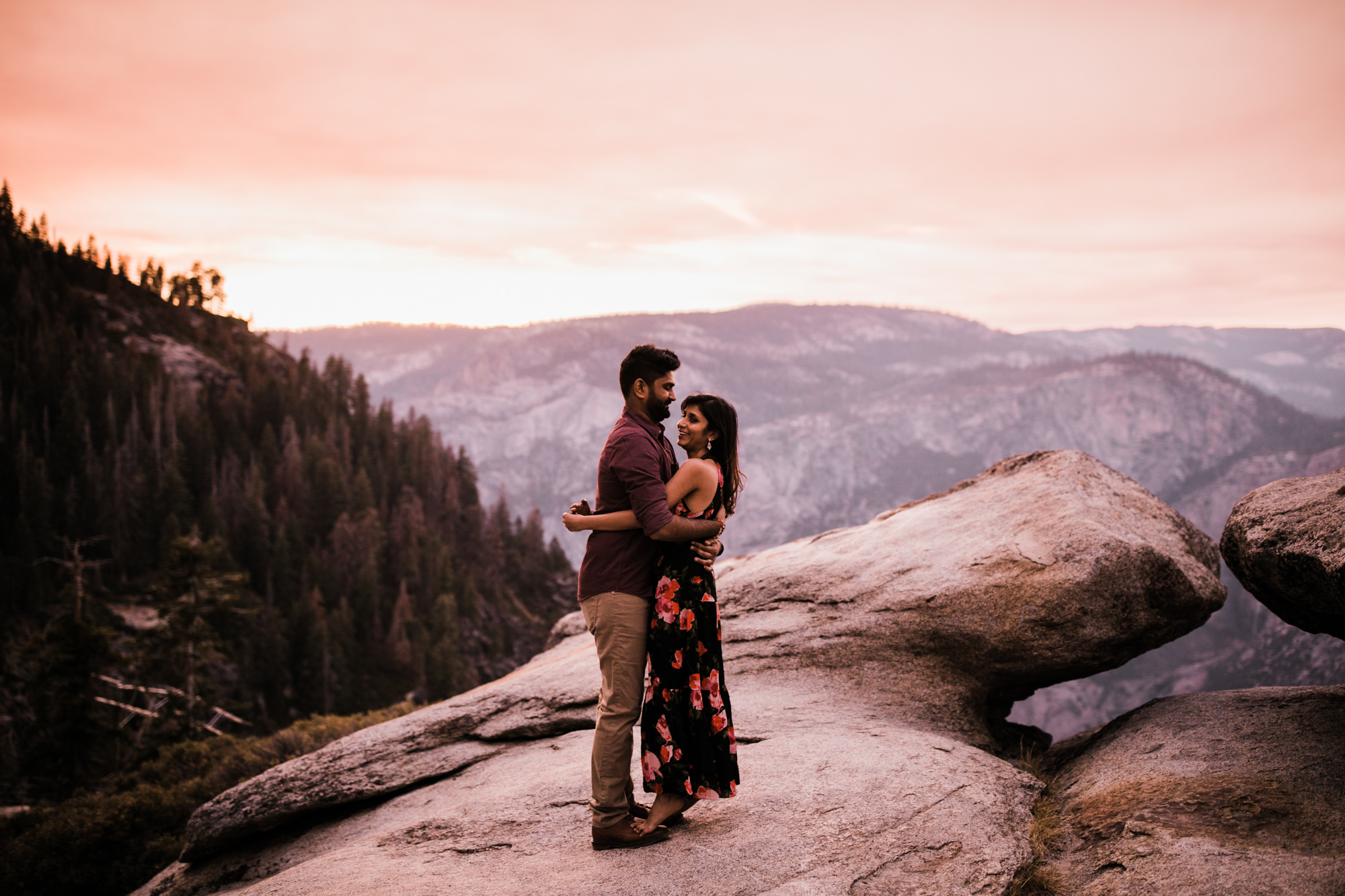 dreema + jay's adventurous engagement session + surprise proposal | yosemite valley + glacier point, yosemite national park | destination elopement photographer | www.thehearnes.com