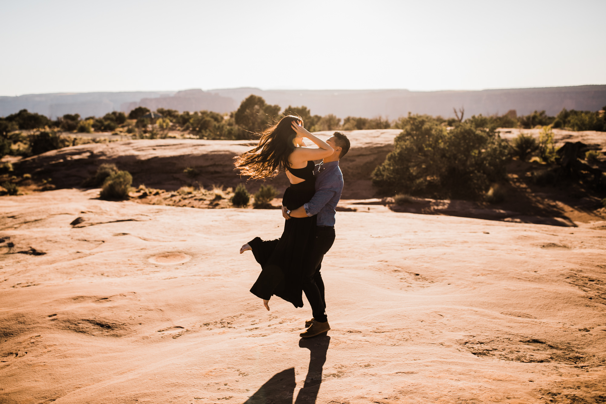 TAMI + ETHAN'S ADVENTUROUS DESERT ENGAGEMENT SESSION | DEAD HORSE POINT STATE PARK | UTAH ELOPEMENT PHOTOGRAPHER | the hearnes adventure photography | www.thehearnes.com