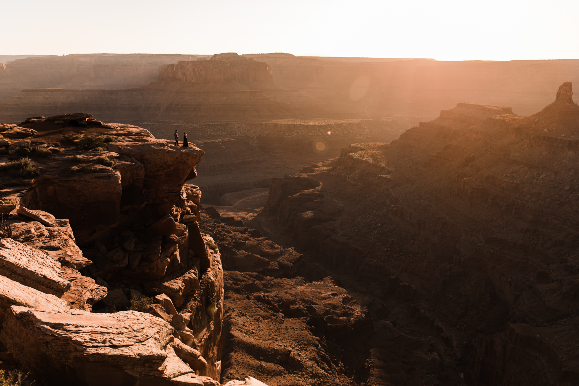 TAMI + ETHAN'S ADVENTUROUS DESERT ENGAGEMENT SESSION | DEAD HORSE POINT STATE PARK | UTAH ELOPEMENT PHOTOGRAPHER | the hearnes adventure photography | www.thehearnes.com