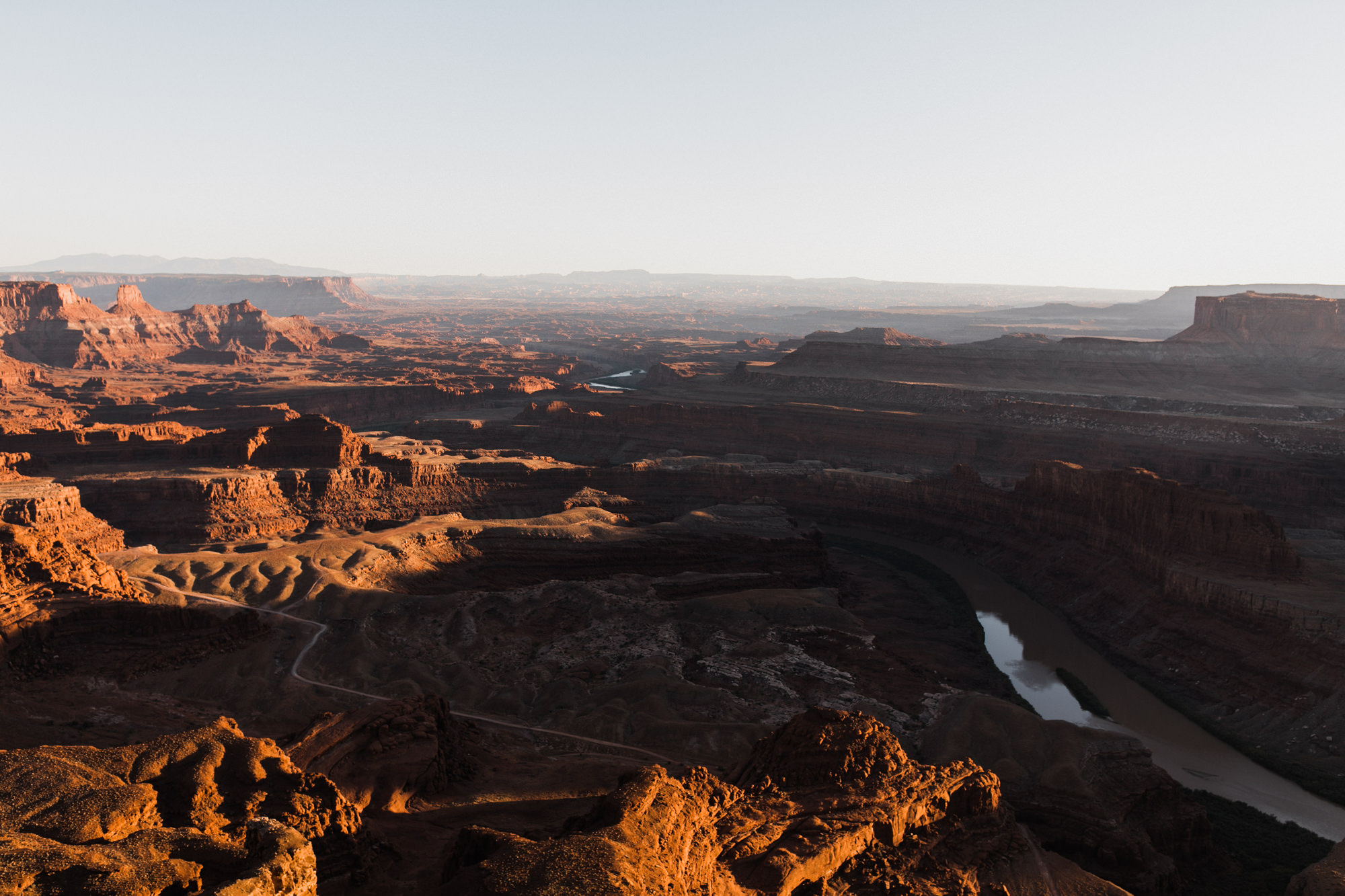 TAMI + ETHAN'S ADVENTUROUS DESERT ENGAGEMENT SESSION | DEAD HORSE POINT STATE PARK | UTAH ELOPEMENT PHOTOGRAPHER | the hearnes adventure photography | www.thehearnes.com