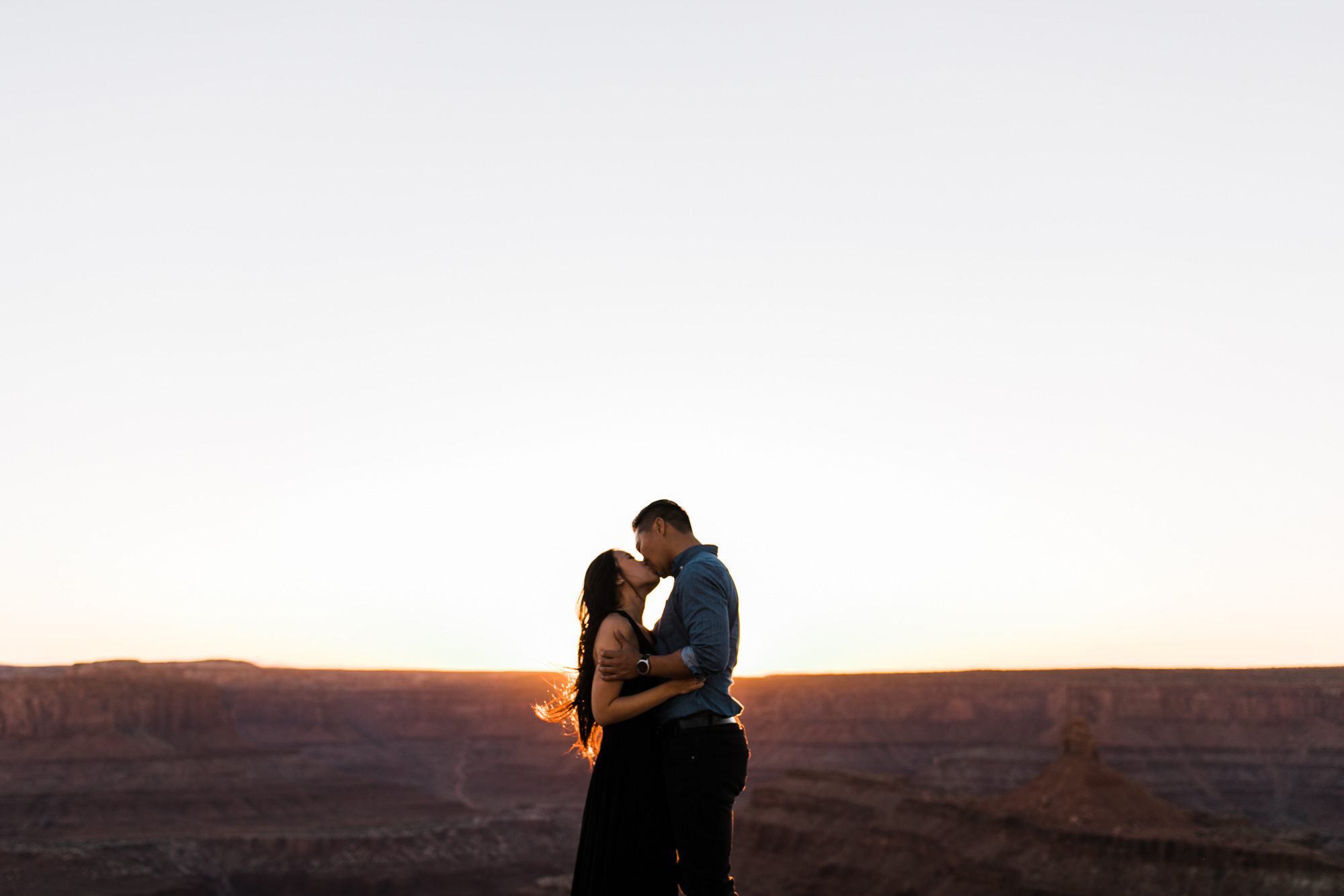 TAMI + ETHAN'S ADVENTUROUS DESERT ENGAGEMENT SESSION | DEAD HORSE POINT STATE PARK | UTAH ELOPEMENT PHOTOGRAPHER | the hearnes adventure photography | www.thehearnes.com