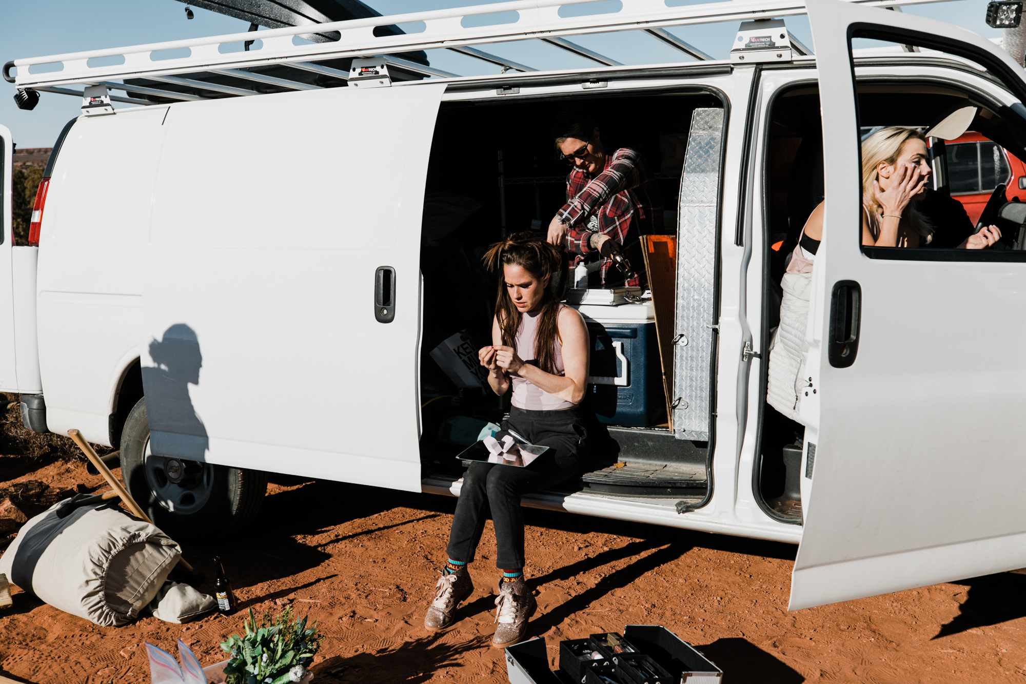 spacenet wedding 400 feet above a canyon in moab, utah | adventurous desert elopement | galia lahav bride | the hearnes adventure wedding photography | www.thehearnes.com