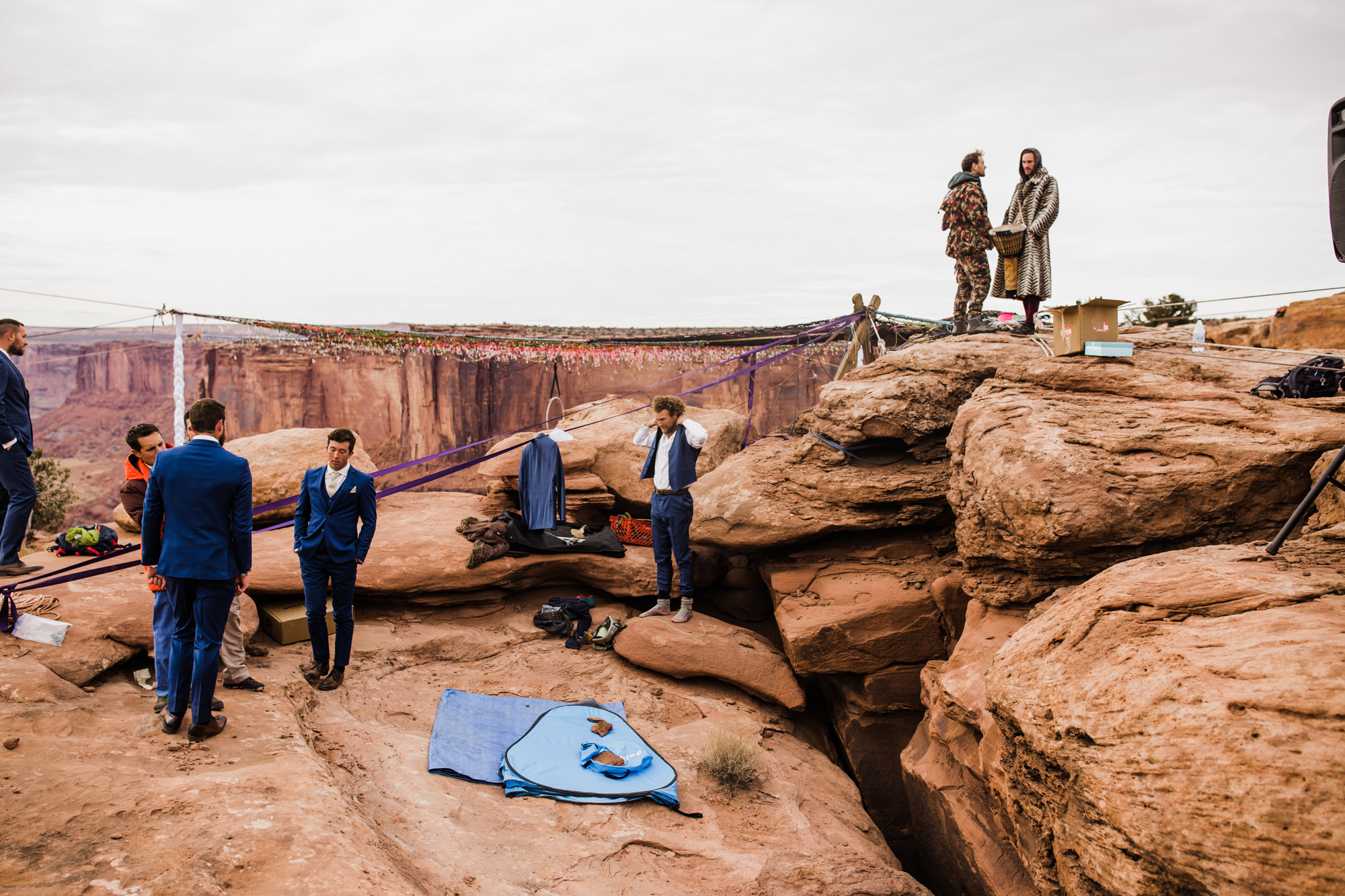 spacenet wedding 400 feet above a canyon in moab, utah | adventurous desert elopement | galia lahav bride | the hearnes adventure wedding photography | www.thehearnes.com