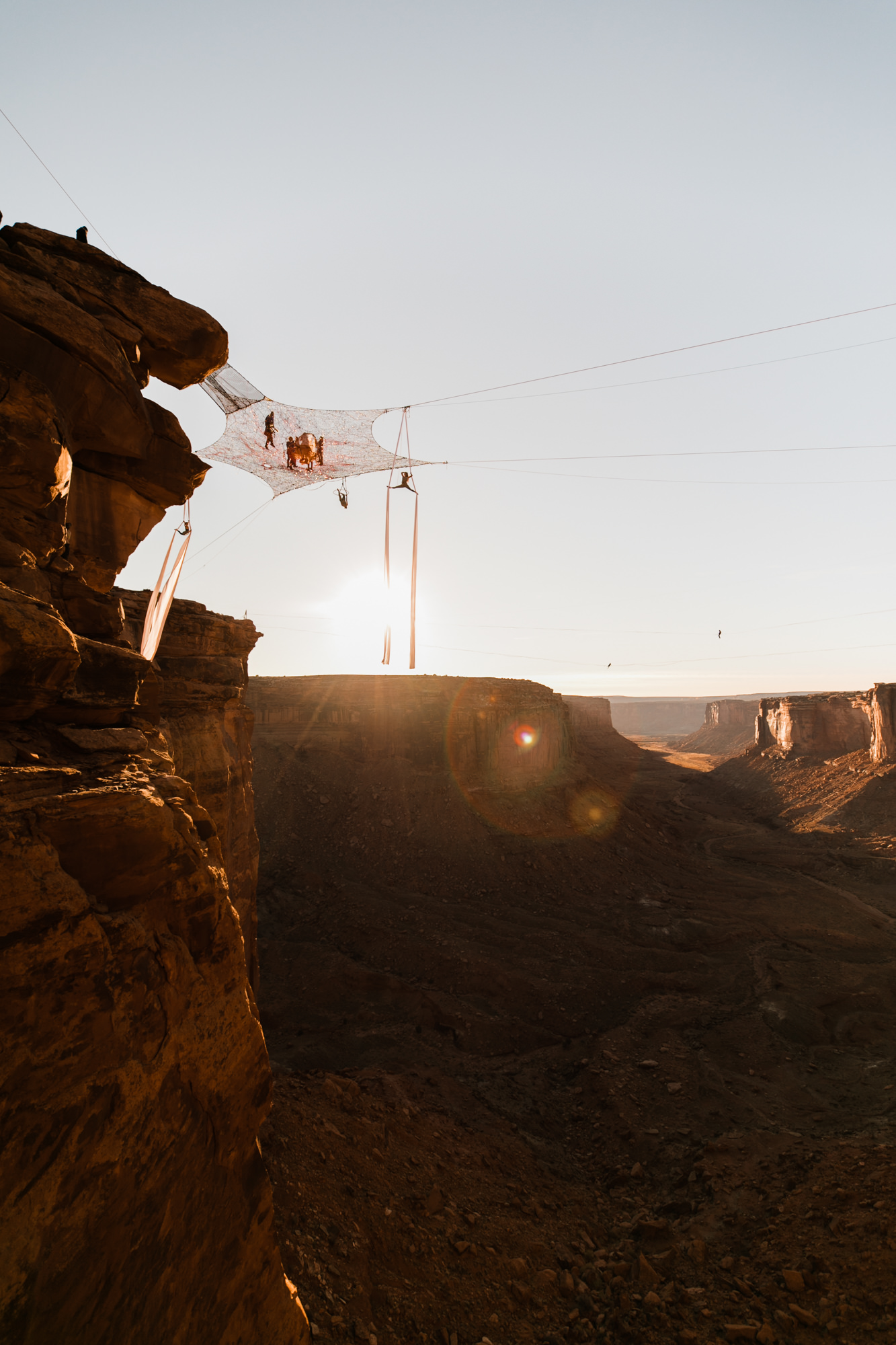 spacenet wedding 400 feet above a canyon in moab, utah | adventurous desert elopement | galia lahav bride | the hearnes adventure wedding photography | www.thehearnes.com