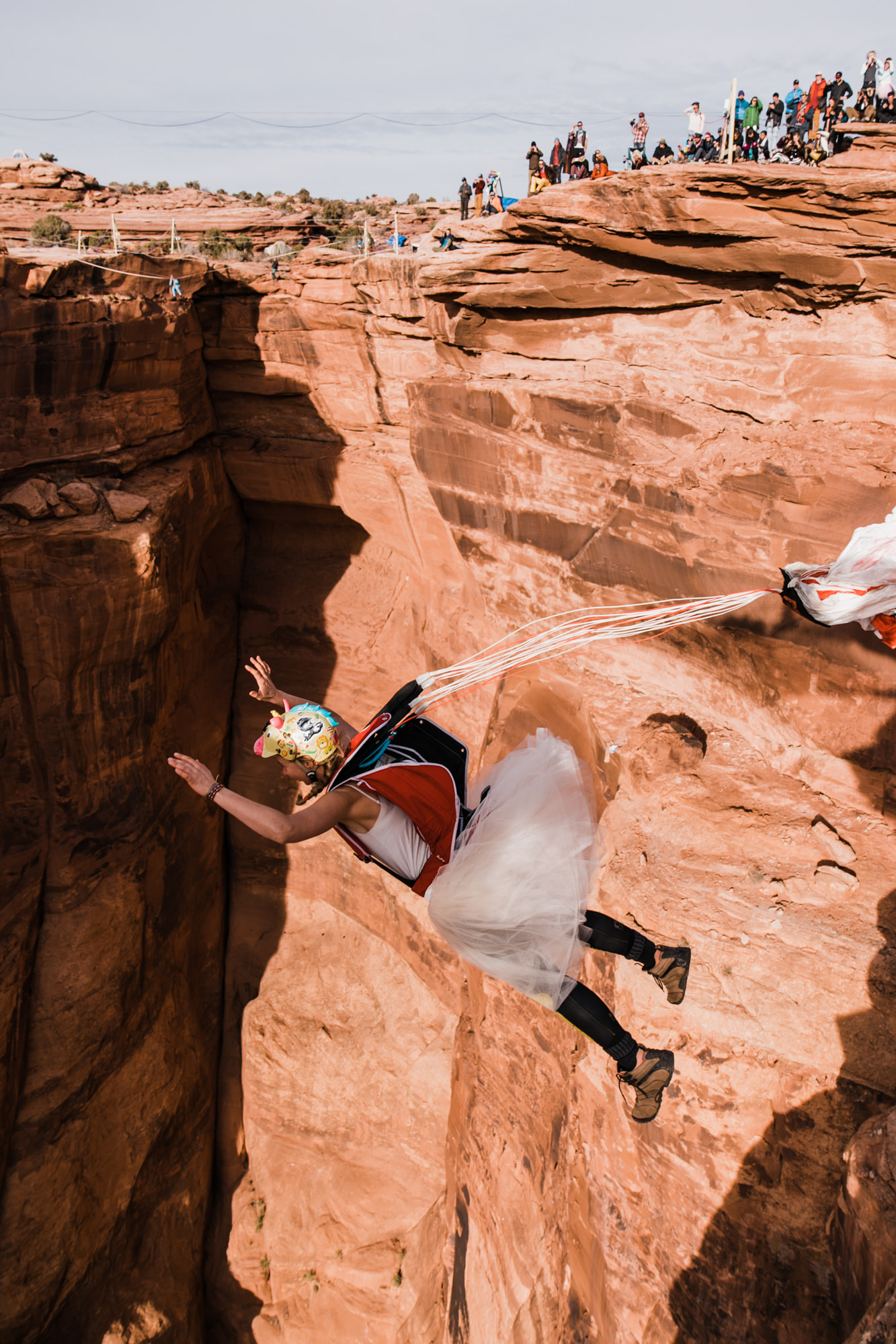 spacenet wedding 400 feet above a canyon in moab, utah | adventurous desert elopement | galia lahav bride | the hearnes adventure wedding photography | www.thehearnes.com