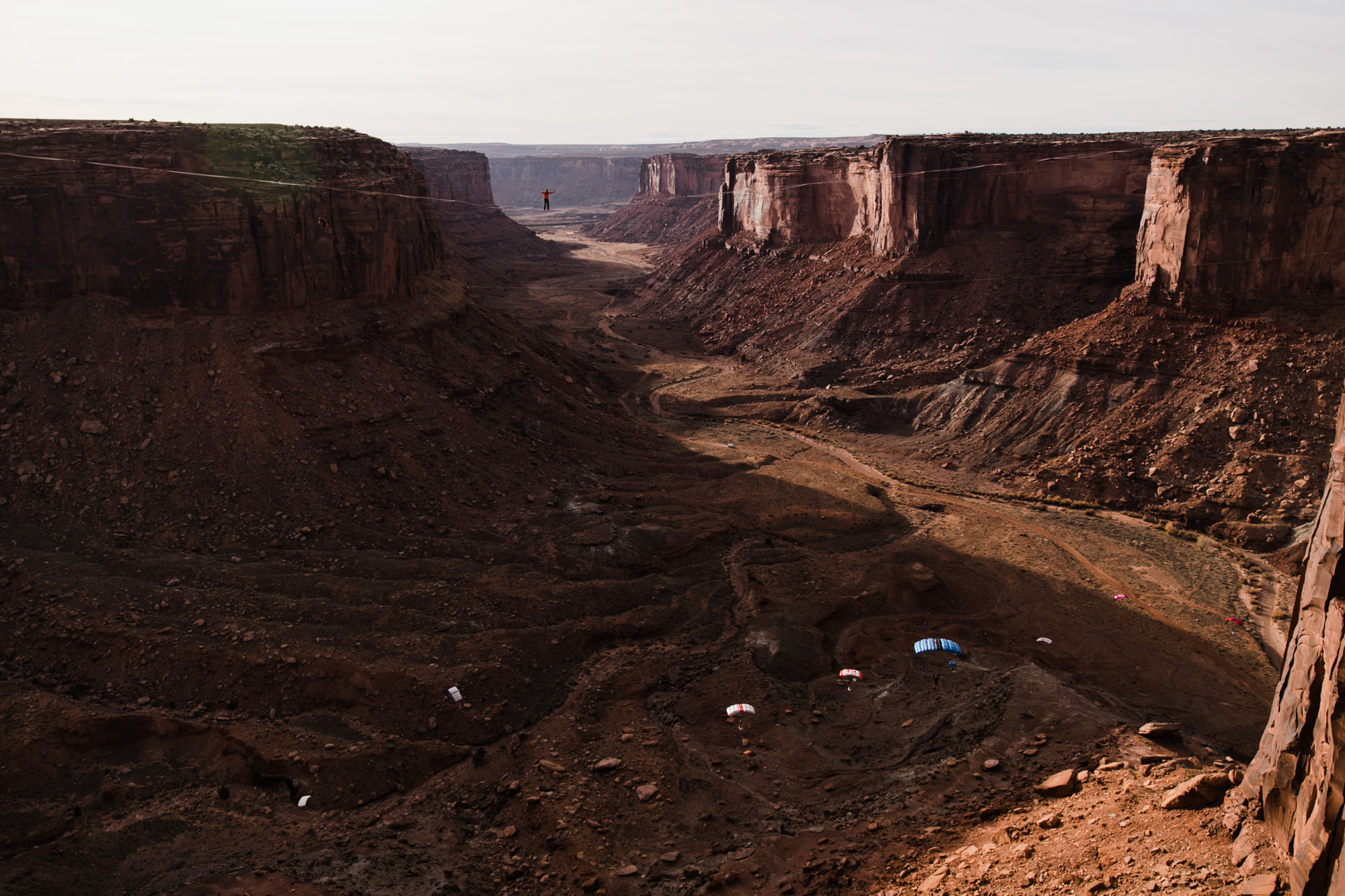 spacenet wedding 400 feet above a canyon in moab, utah | adventurous desert elopement | galia lahav bride | the hearnes adventure wedding photography | www.thehearnes.com