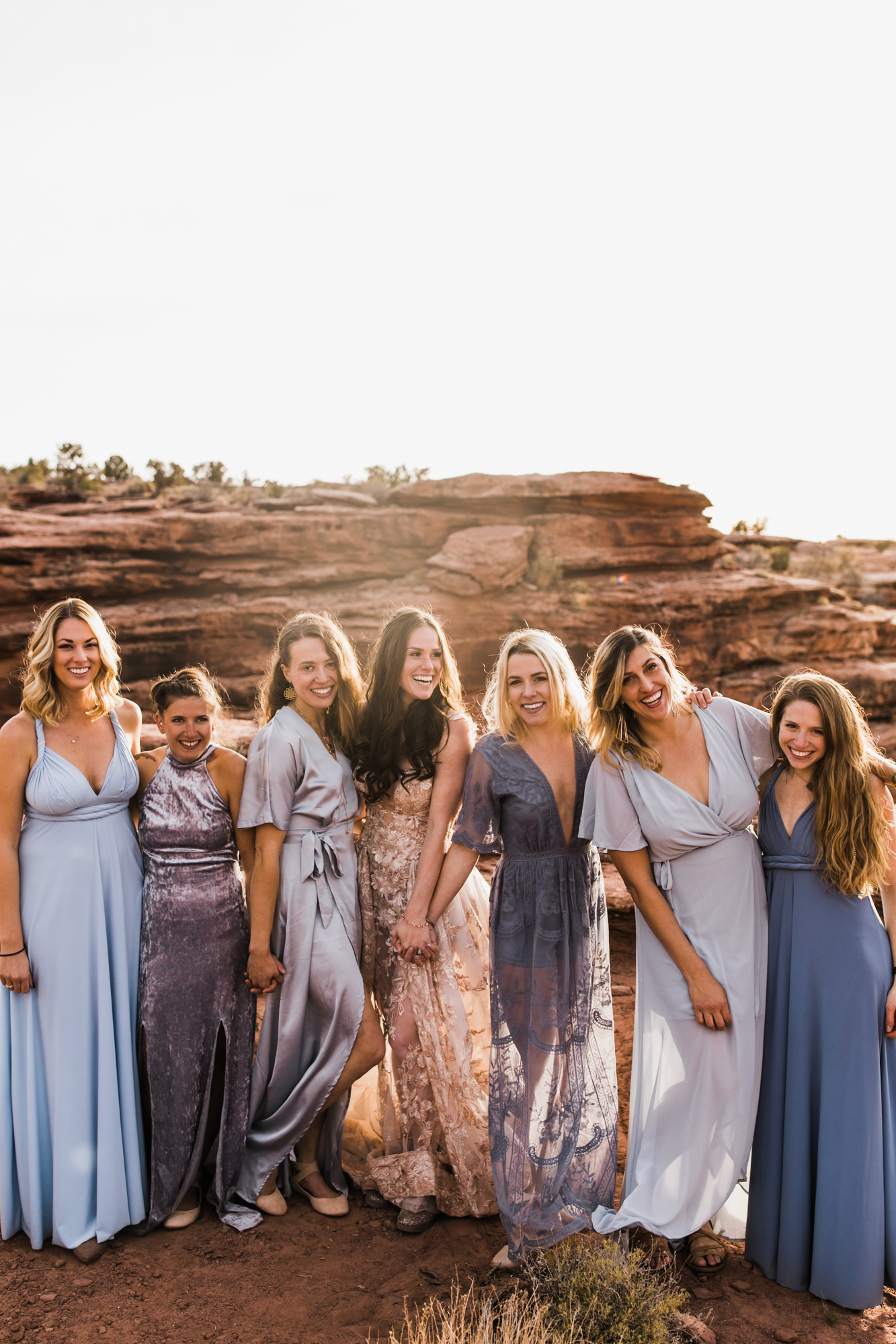 spacenet wedding 400 feet above a canyon in moab, utah | adventurous desert elopement | galia lahav bride | the hearnes adventure wedding photography | www.thehearnes.com