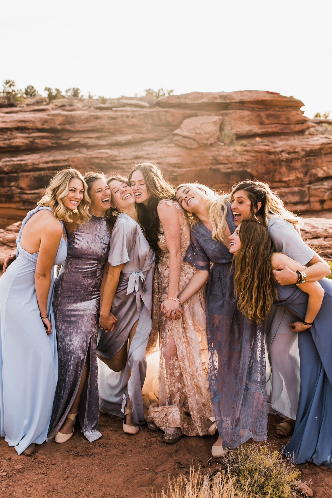 spacenet wedding 400 feet above a canyon in moab, utah | adventurous desert elopement | galia lahav bride | the hearnes adventure wedding photography | www.thehearnes.com