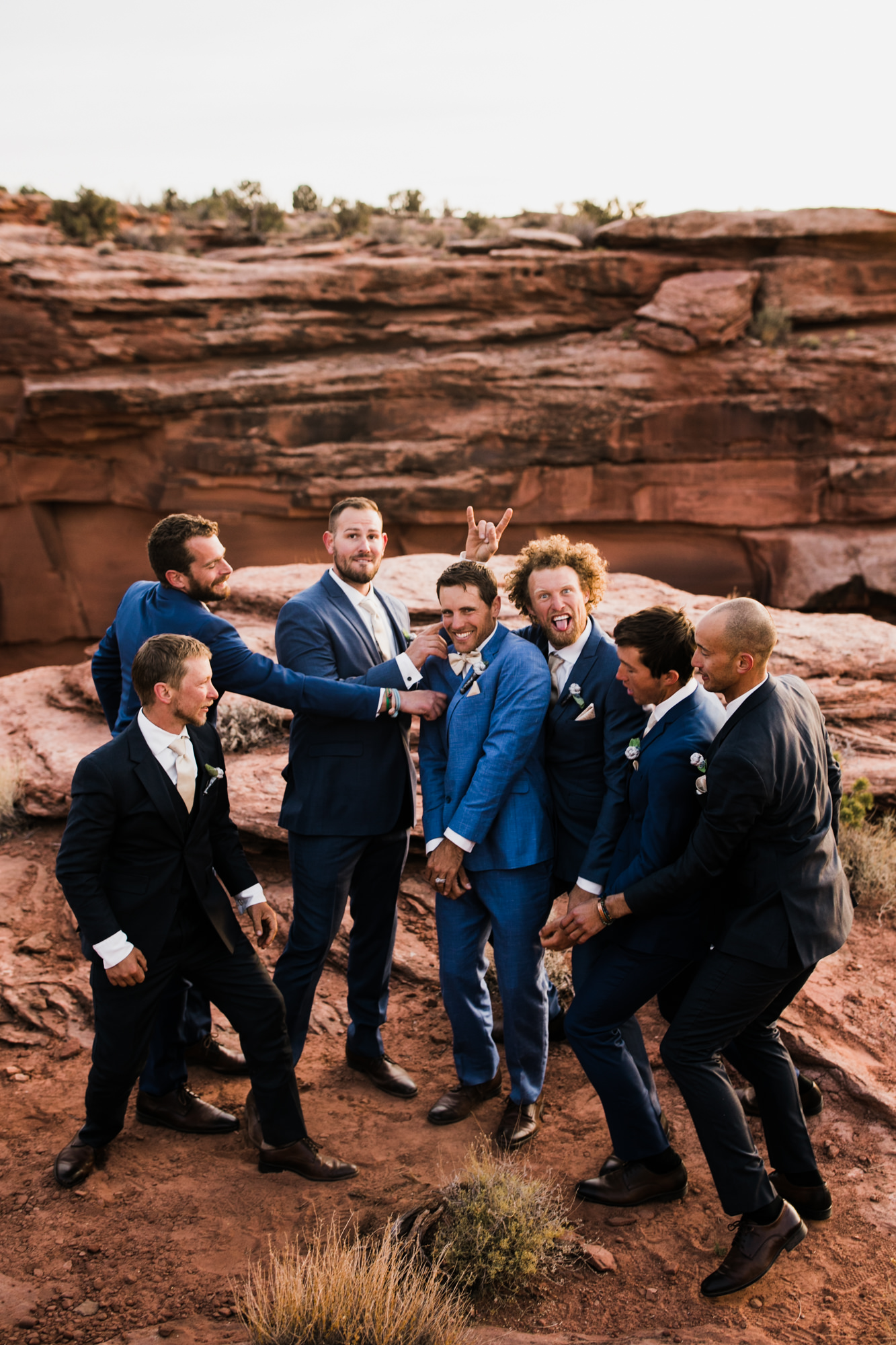 spacenet wedding 400 feet above a canyon in moab, utah | adventurous desert elopement | galia lahav bride | the hearnes adventure wedding photography | www.thehearnes.com