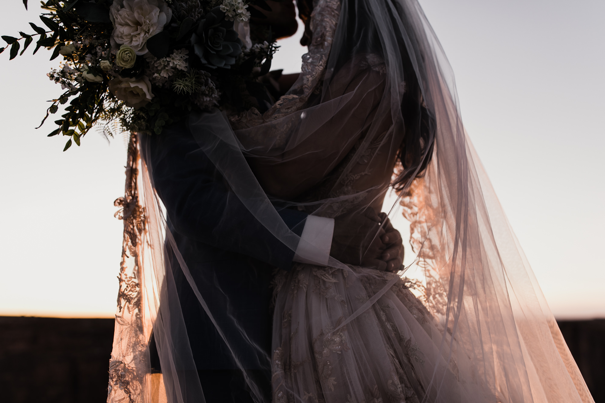spacenet wedding 400 feet above a canyon in moab, utah | adventurous desert elopement | galia lahav bride | the hearnes adventure wedding photography | www.thehearnes.com
