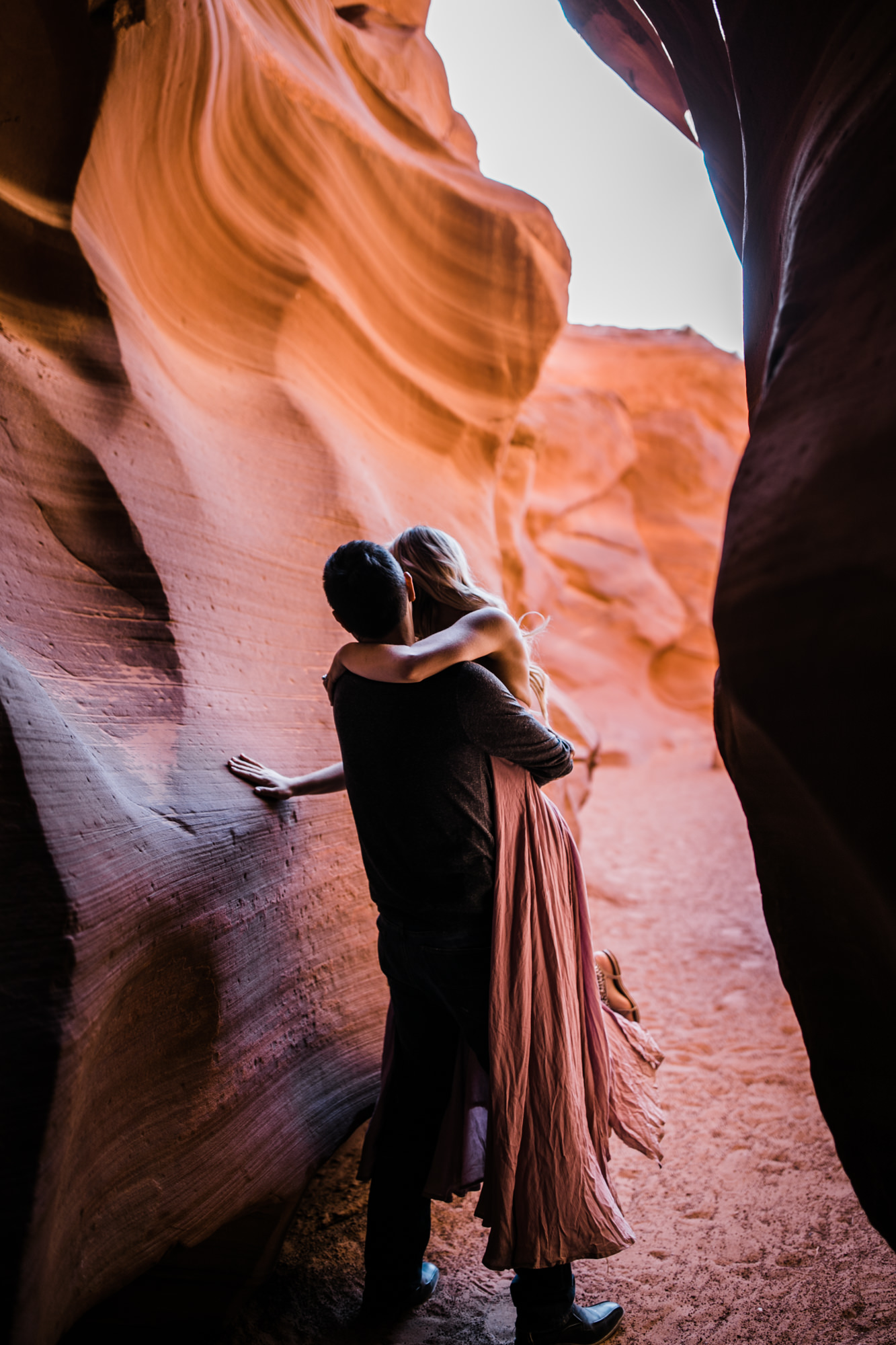 adventure elopement session in antelope canyon | destination engagement photo inspiration | utah adventure elopement photographers | the hearnes adventure photography | www.thehearnes.com