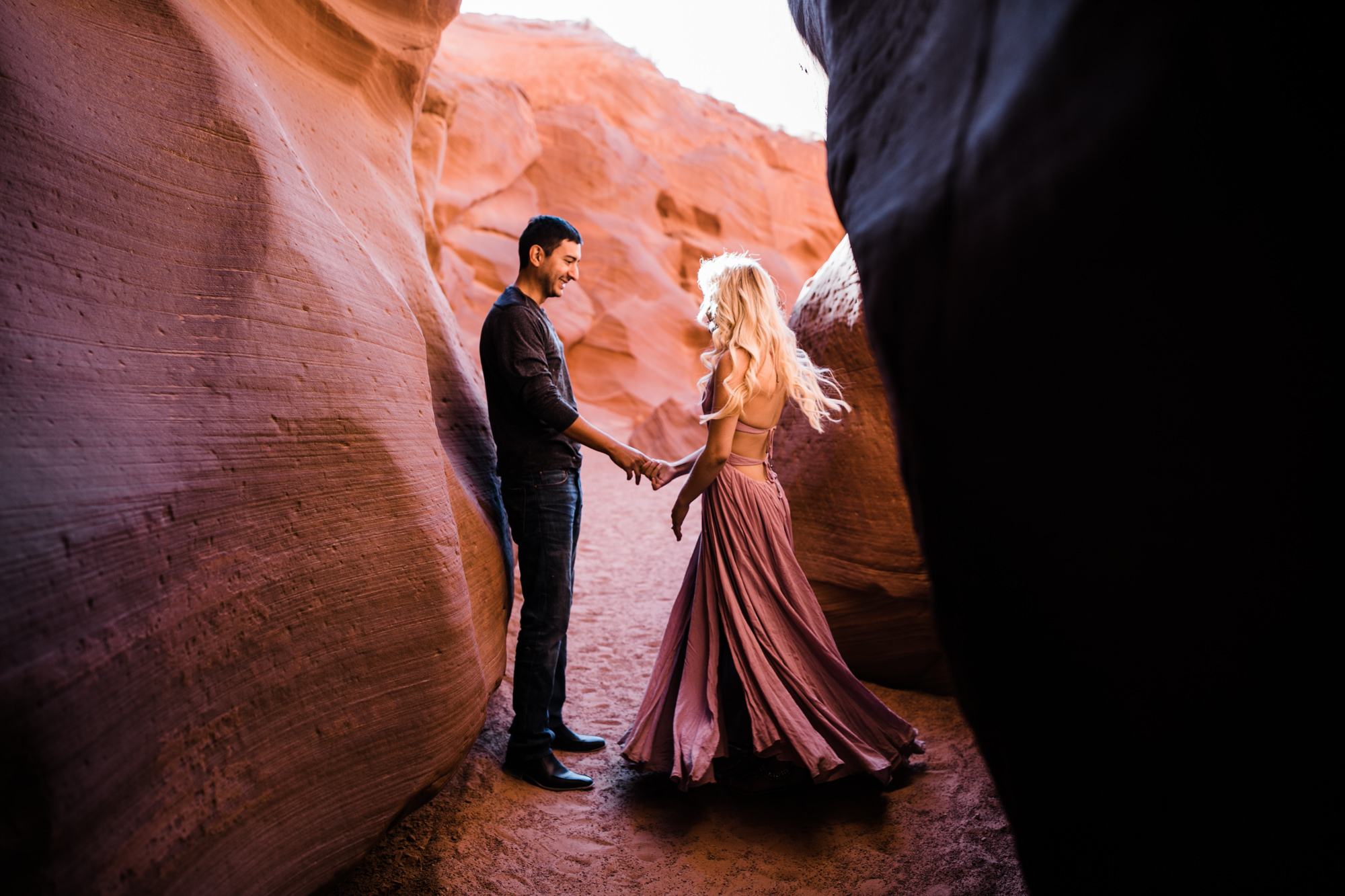 adventure elopement session in antelope canyon | destination engagement photo inspiration | utah adventure elopement photographers | the hearnes adventure photography | www.thehearnes.com