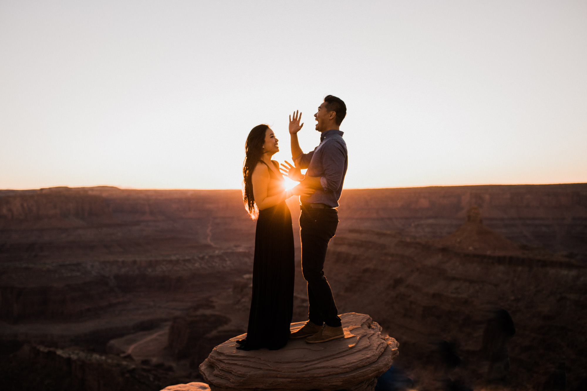 adventure engagement session in moab, utah | destination engagement photo inspiration | utah adventure elopement photographers | the hearnes adventure photography | www.thehearnes.com