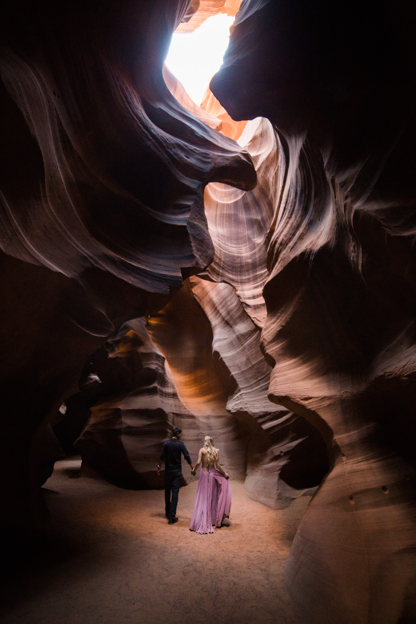 adventure elopement session in antelope canyon | destination engagement photo inspiration | utah adventure elopement photographers | the hearnes adventure photography | www.thehearnes.com