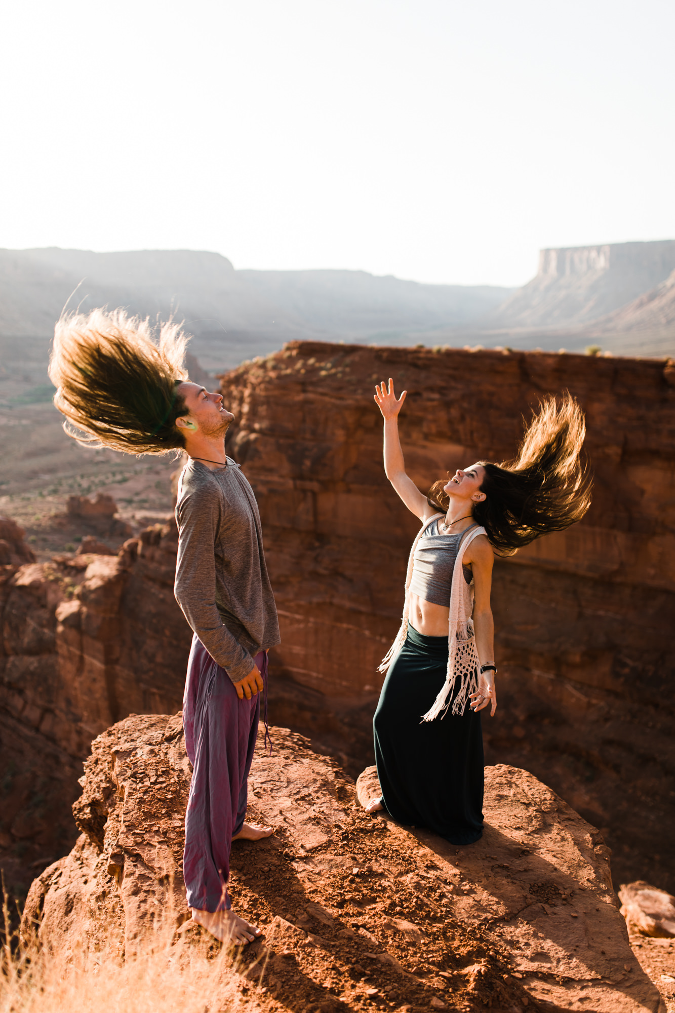 adventure engagement session in moab, utah | destination engagement photo inspiration | utah adventure elopement photographers | the hearnes adventure photography | www.thehearnes.com