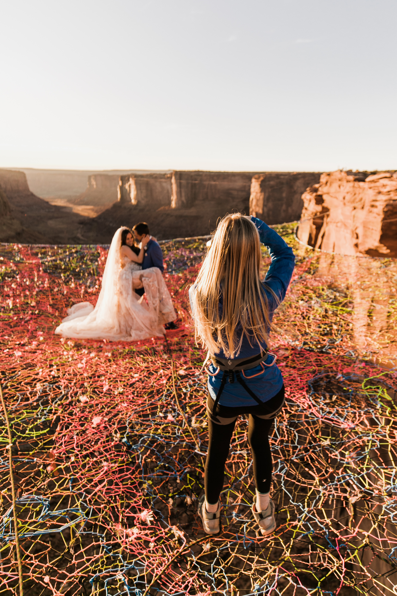 photographing a wedding on a spacenet in moab, utah | utah and california adventure elopement photographers | the hearnes adventure photography | www.thehearnes.com