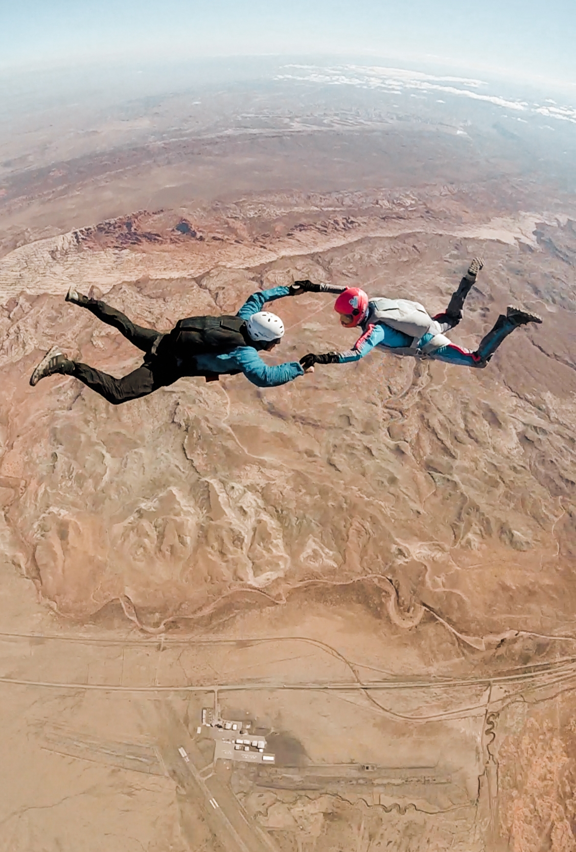 skydiving in moab, utah | utah and california adventure elopement photographers | the hearnes adventure photography | www.thehearnes.com
