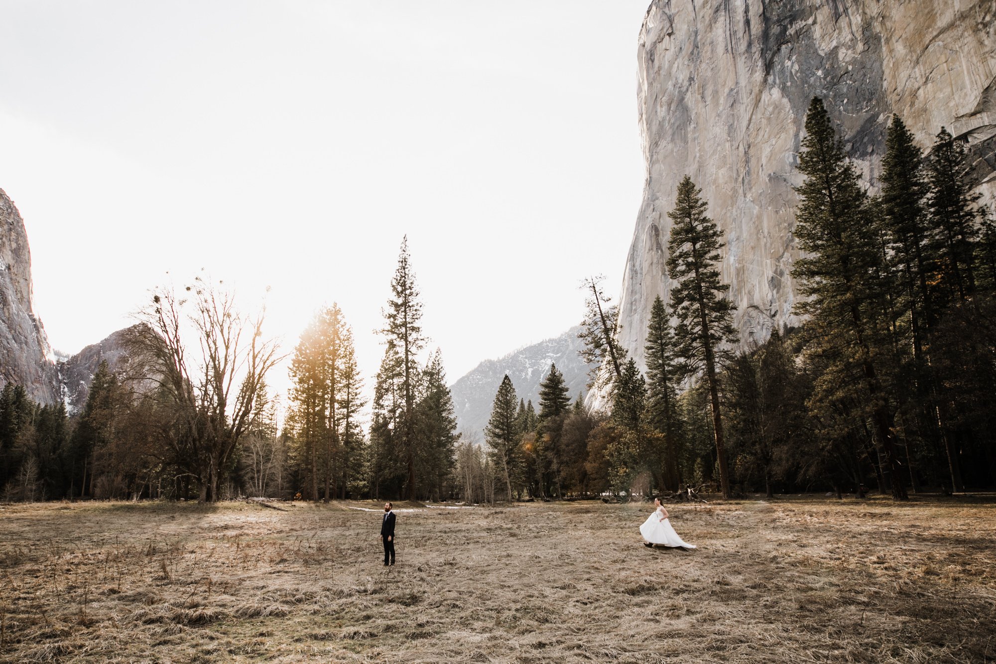winter elopement first look in yosemite national park | The Hearnes Adventure Photography