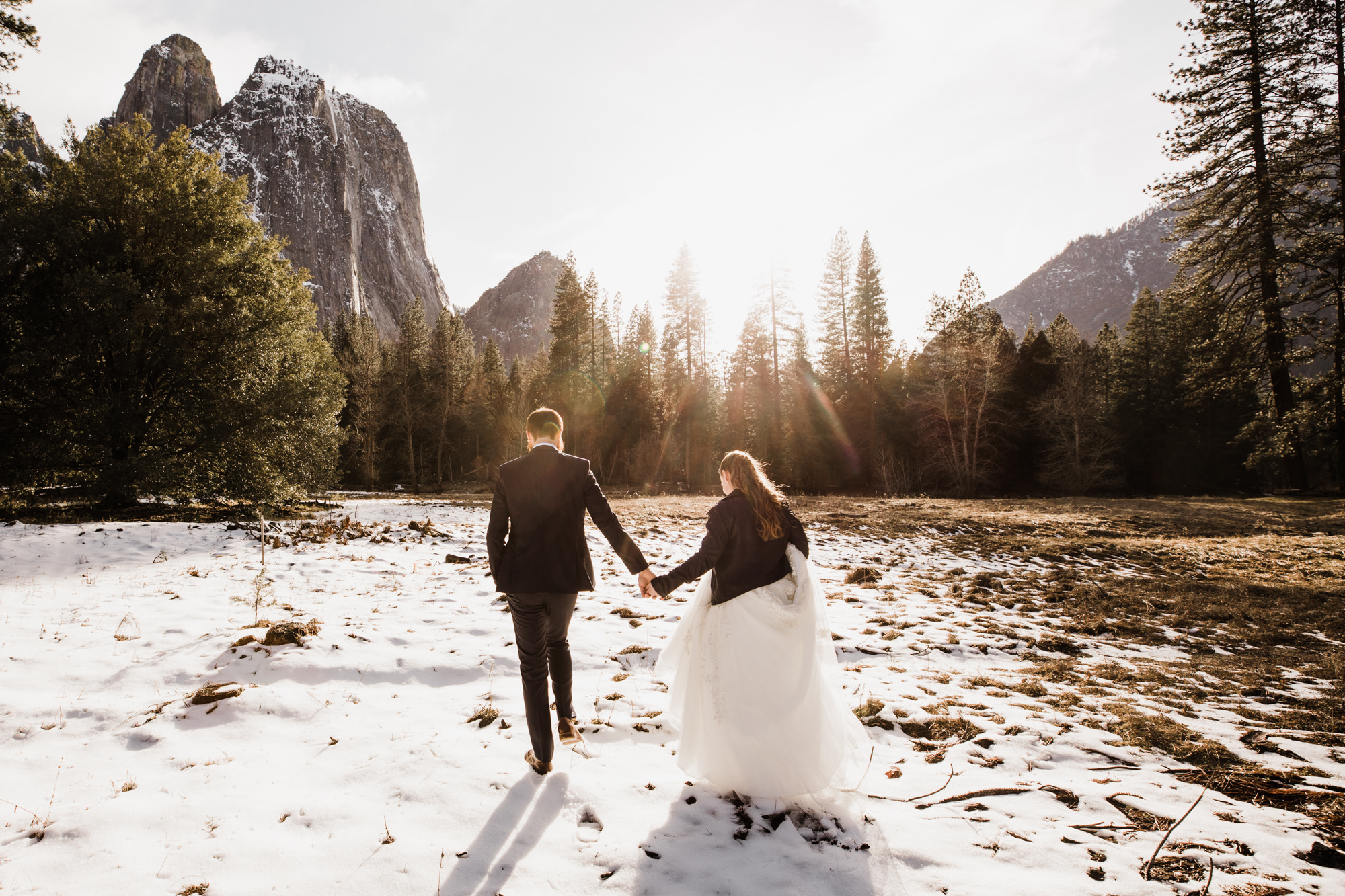 winter elopement first look in yosemite national park | The Hearnes Adventure Photography