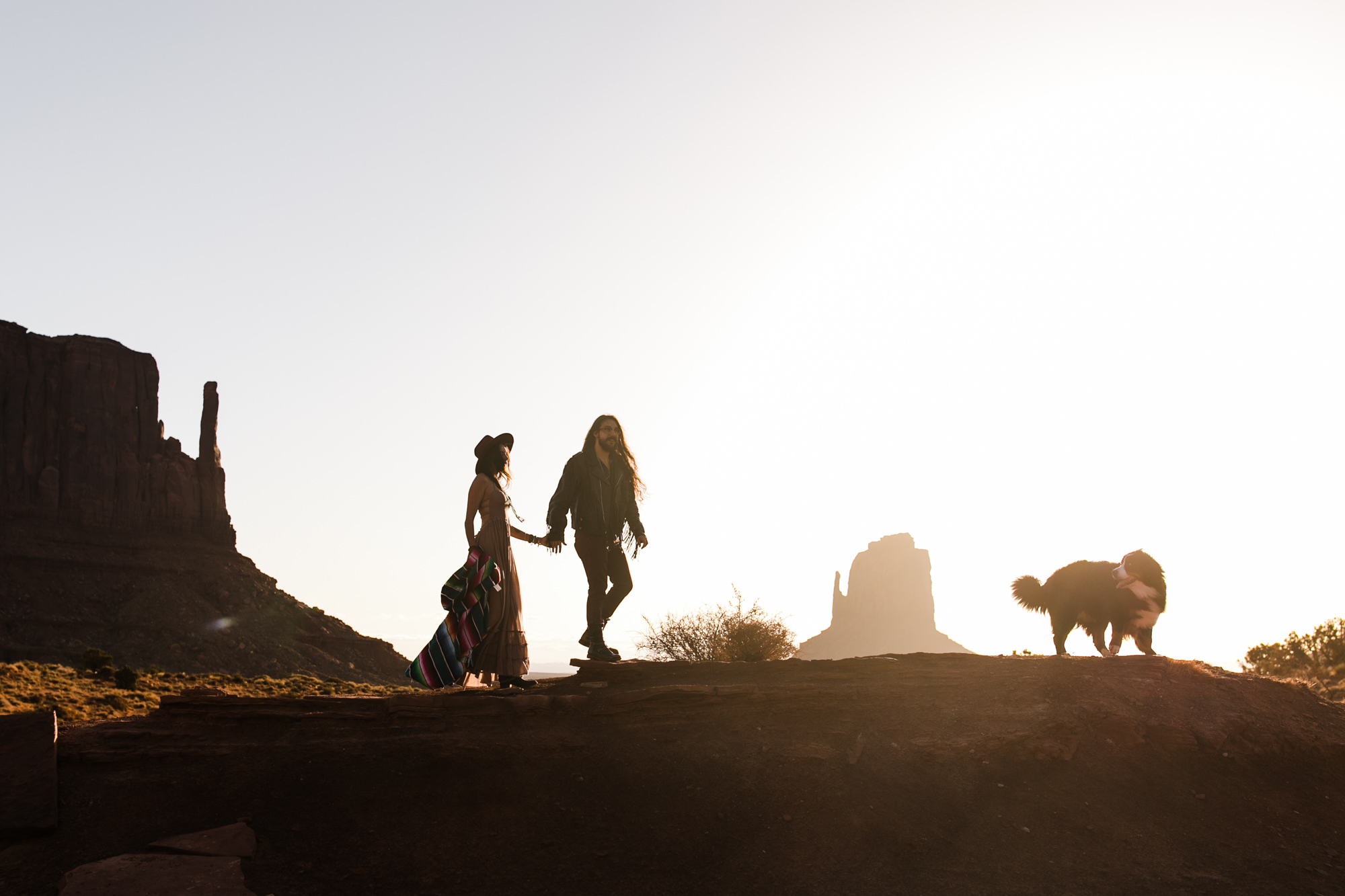 rachel + ryan's western stylish engagement session in monument valley | desert elopement inspiration | boho southwestern style | the hearnes adventure photography | www.thehearnes.com