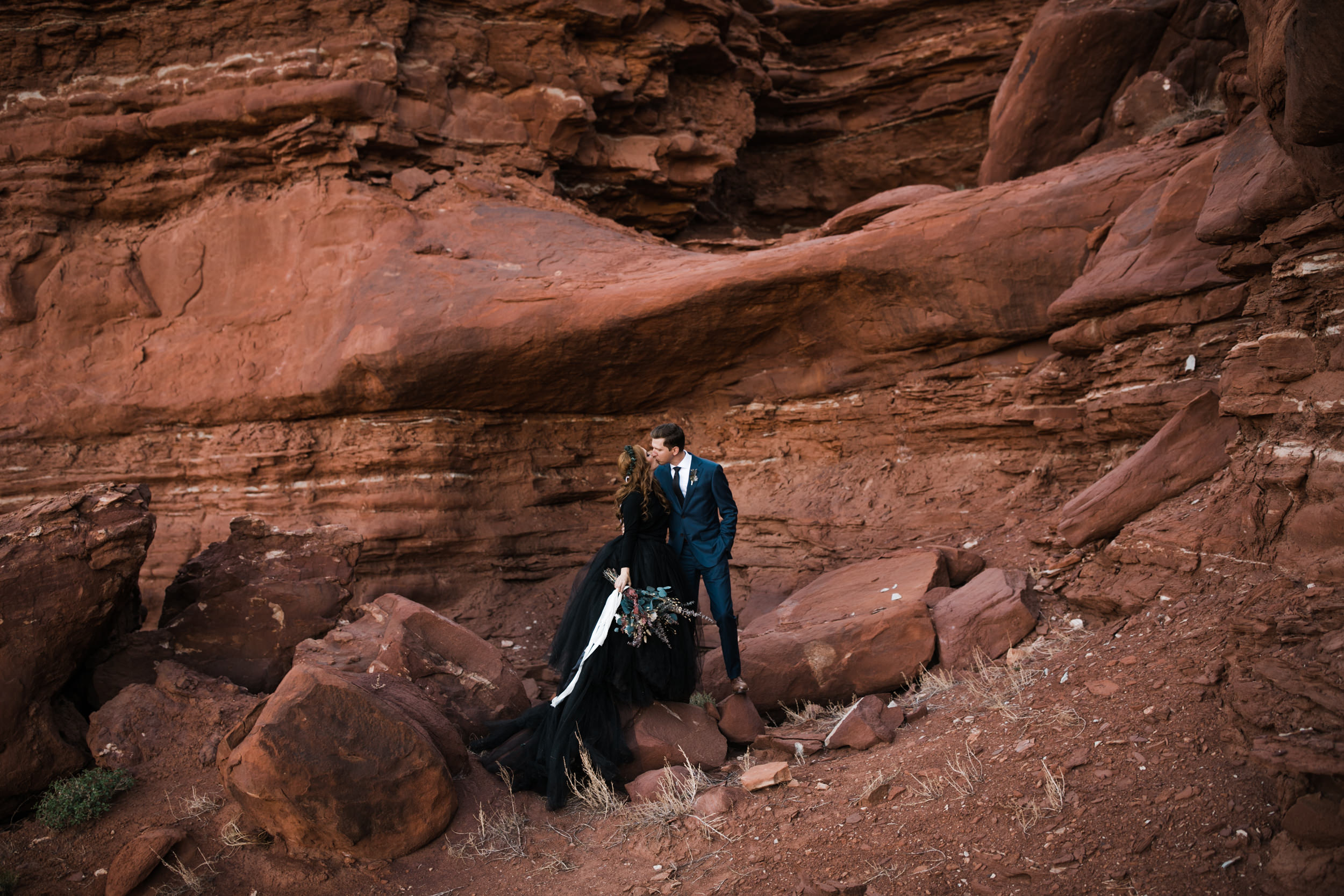 ben + rachelle's elopement in a secret canyon near Moab, Utah | canyonlands national park first look + portraits | secret ceremony on the edge of a cliff | moab adventure wedding photographer