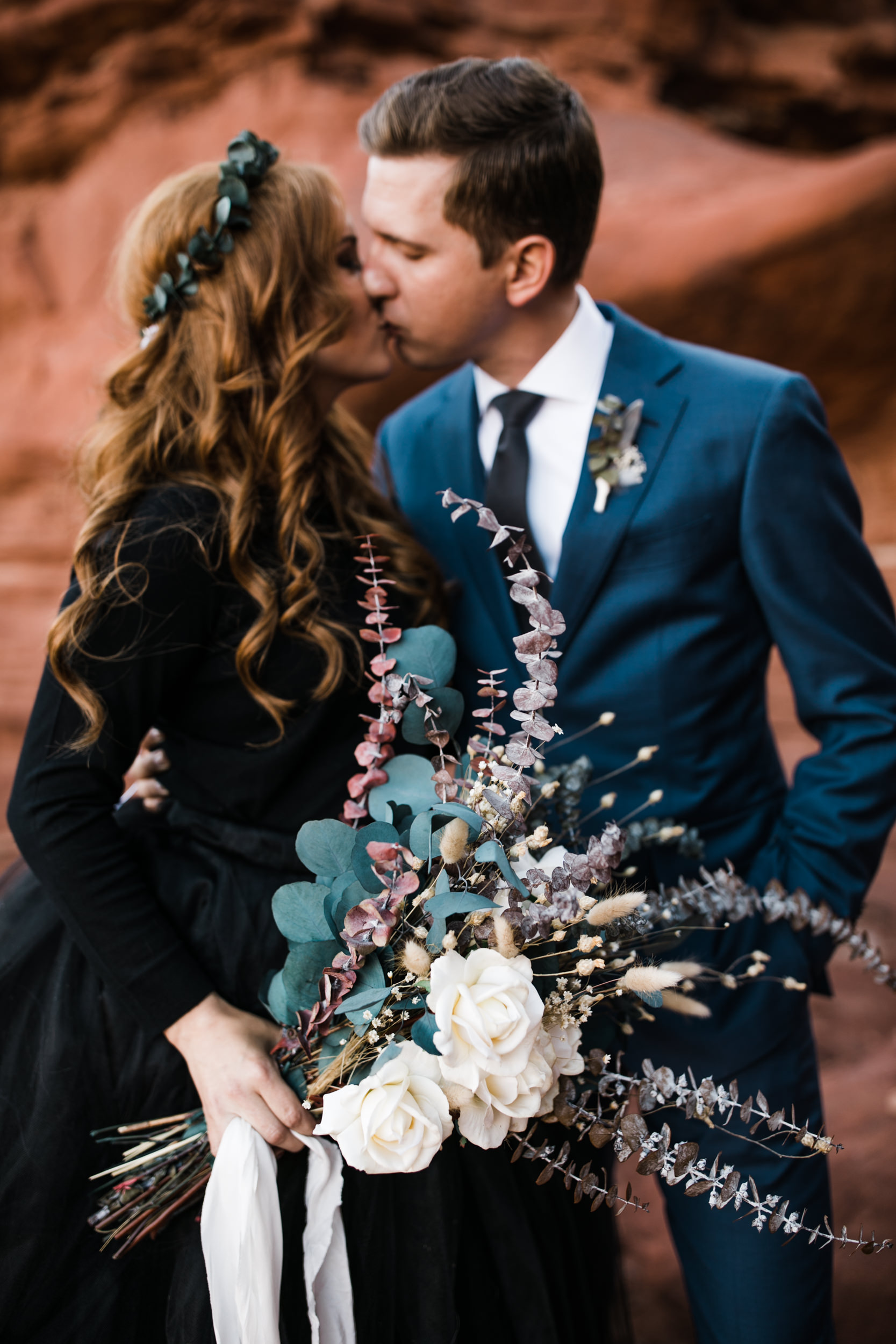 ben + rachelle's elopement in a secret canyon near Moab, Utah | canyonlands national park first look + portraits | secret ceremony on the edge of a cliff | moab adventure wedding photographer