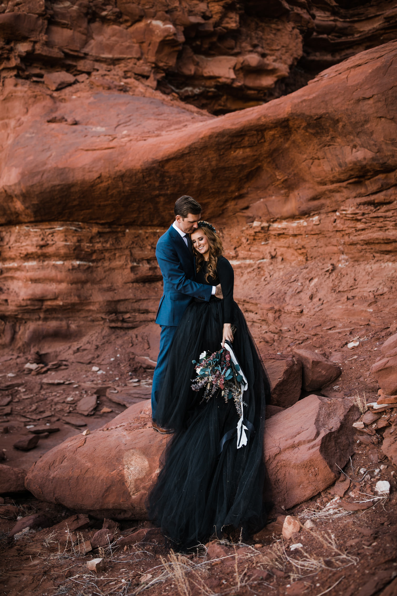 ben + rachelle's elopement in a secret canyon near Moab, Utah | canyonlands national park first look + portraits | secret ceremony on the edge of a cliff | moab adventure wedding photographer