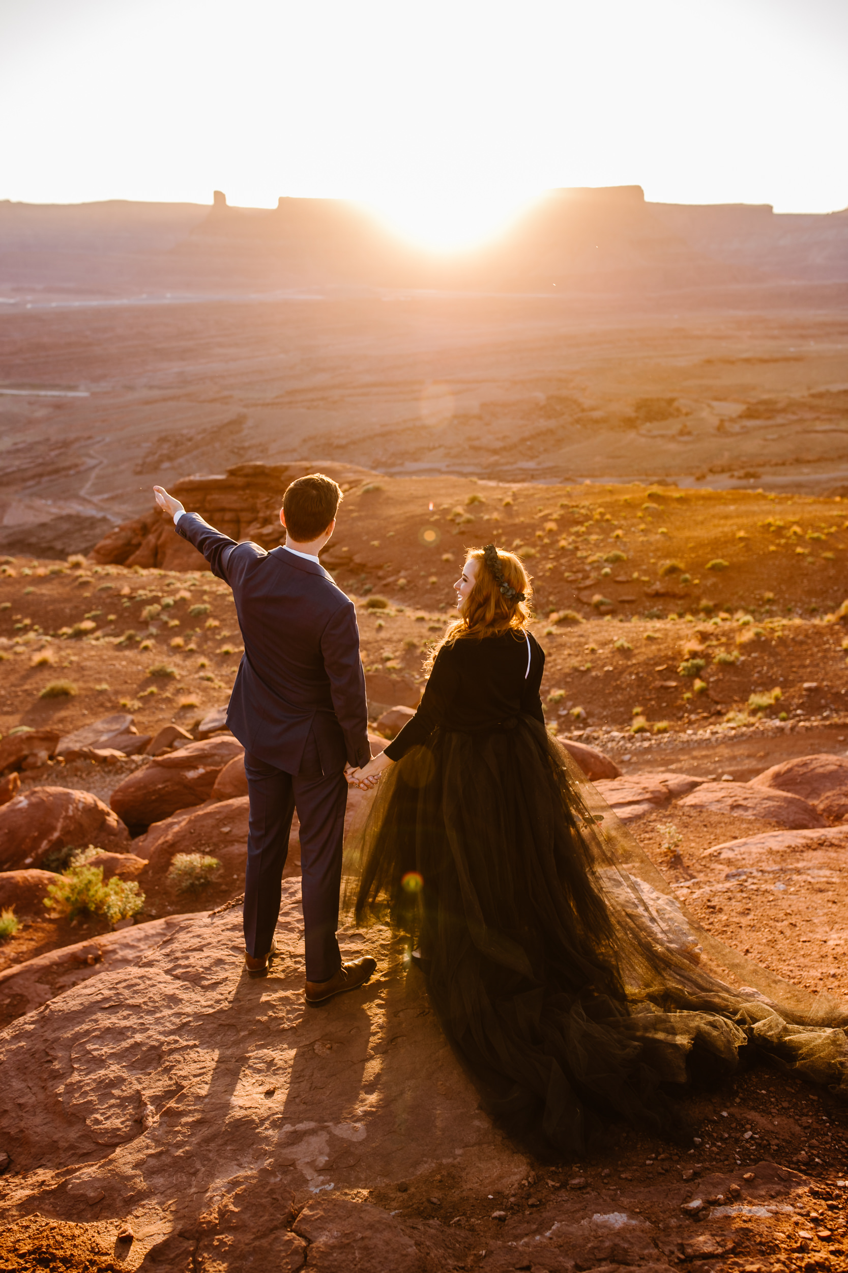 ben + rachelle's elopement in a secret canyon near Moab, Utah | canyonlands national park first look + portraits | secret ceremony on the edge of a cliff | moab adventure wedding photographer