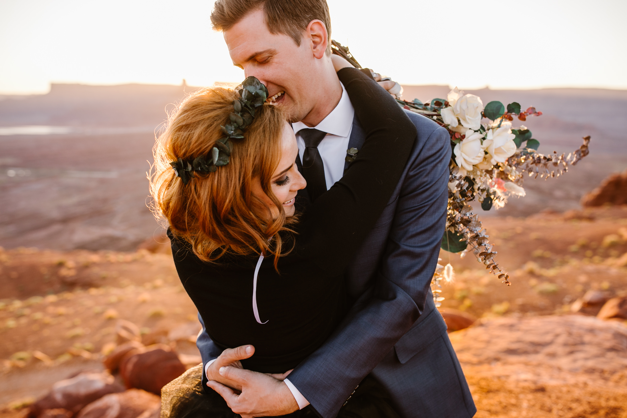 ben + rachelle's elopement in a secret canyon near Moab, Utah | canyonlands national park first look + portraits | secret ceremony on the edge of a cliff | moab adventure wedding photographer