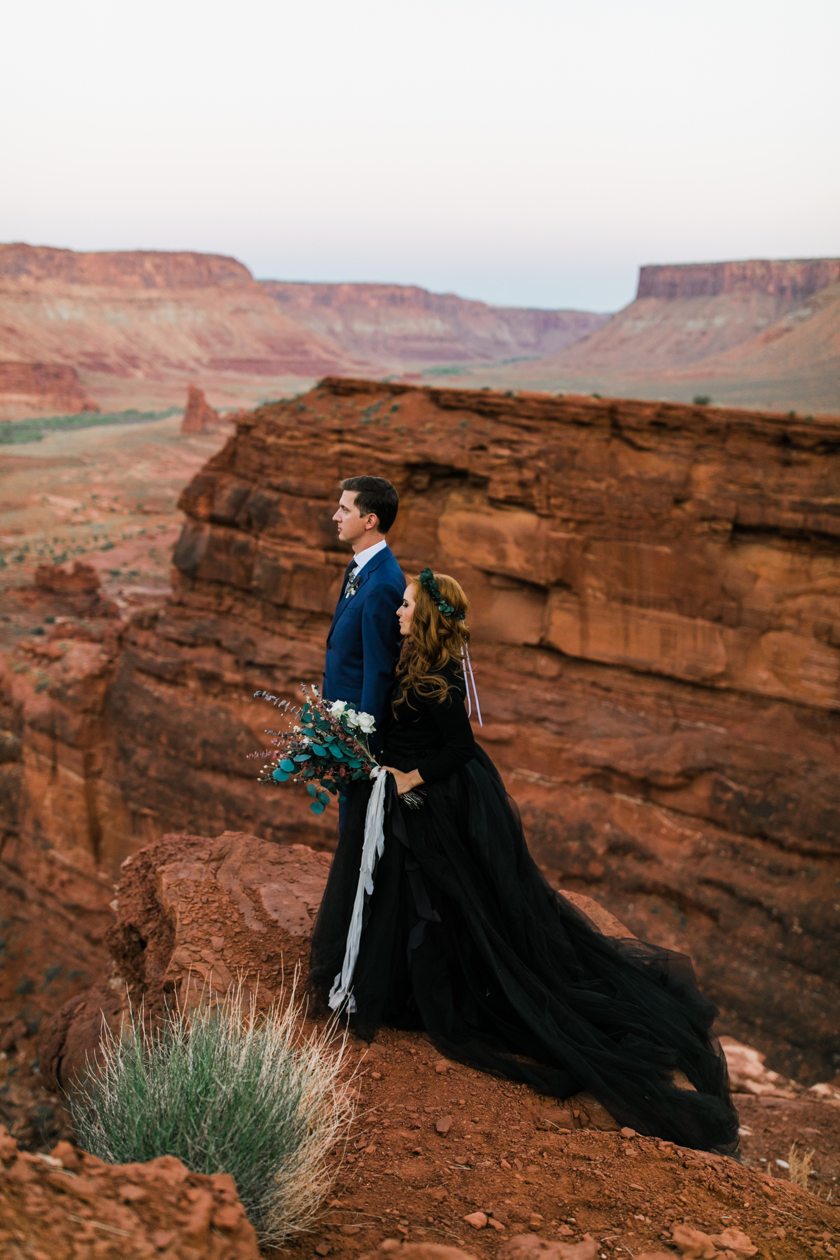 ben + rachelle's elopement in a secret canyon near Moab, Utah | canyonlands national park first look + portraits | secret ceremony on the edge of a cliff | moab adventure wedding photographer