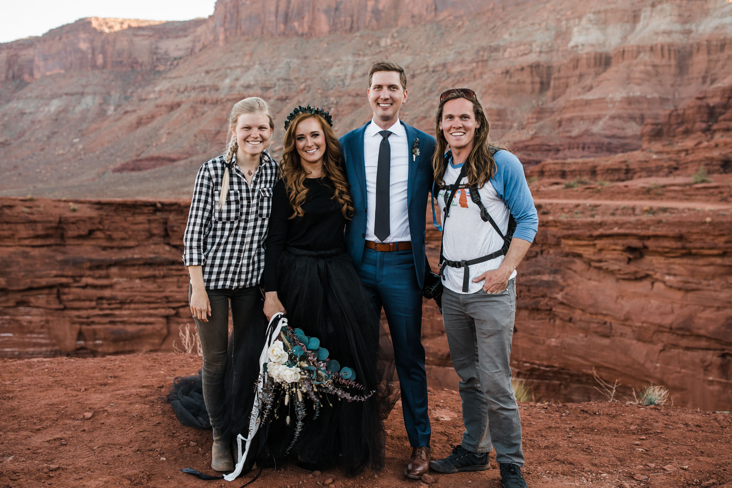 ben + rachelle's elopement in a secret canyon near Moab, Utah | canyonlands national park first look + portraits | secret ceremony on the edge of a cliff | moab adventure wedding photographer