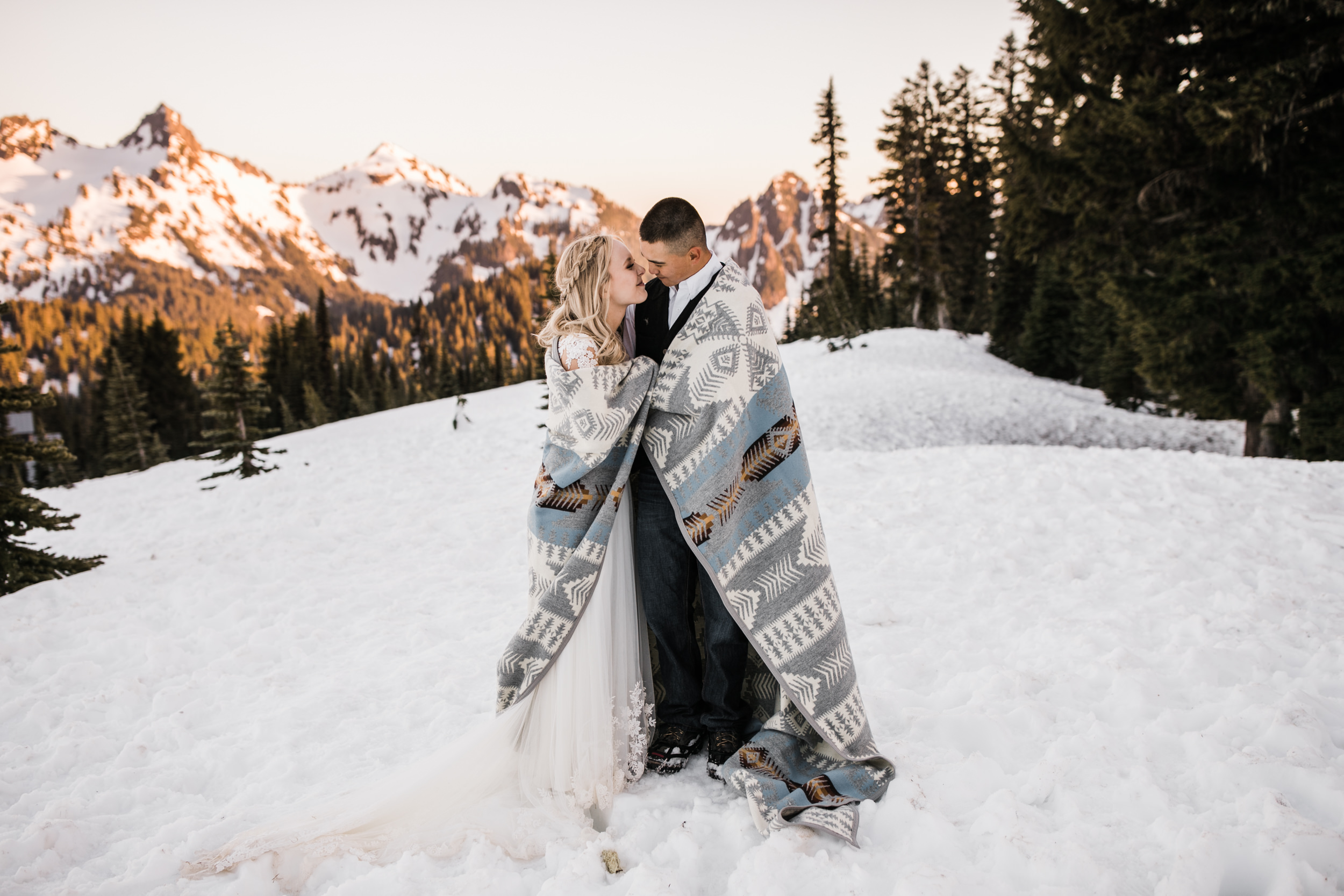 snowy wedding | long sleeve wedding dress | pendleton silver bark wedding blanket | wedding portraits in the snow in mount rainier | first dance in the mountains | national park elopement photographer