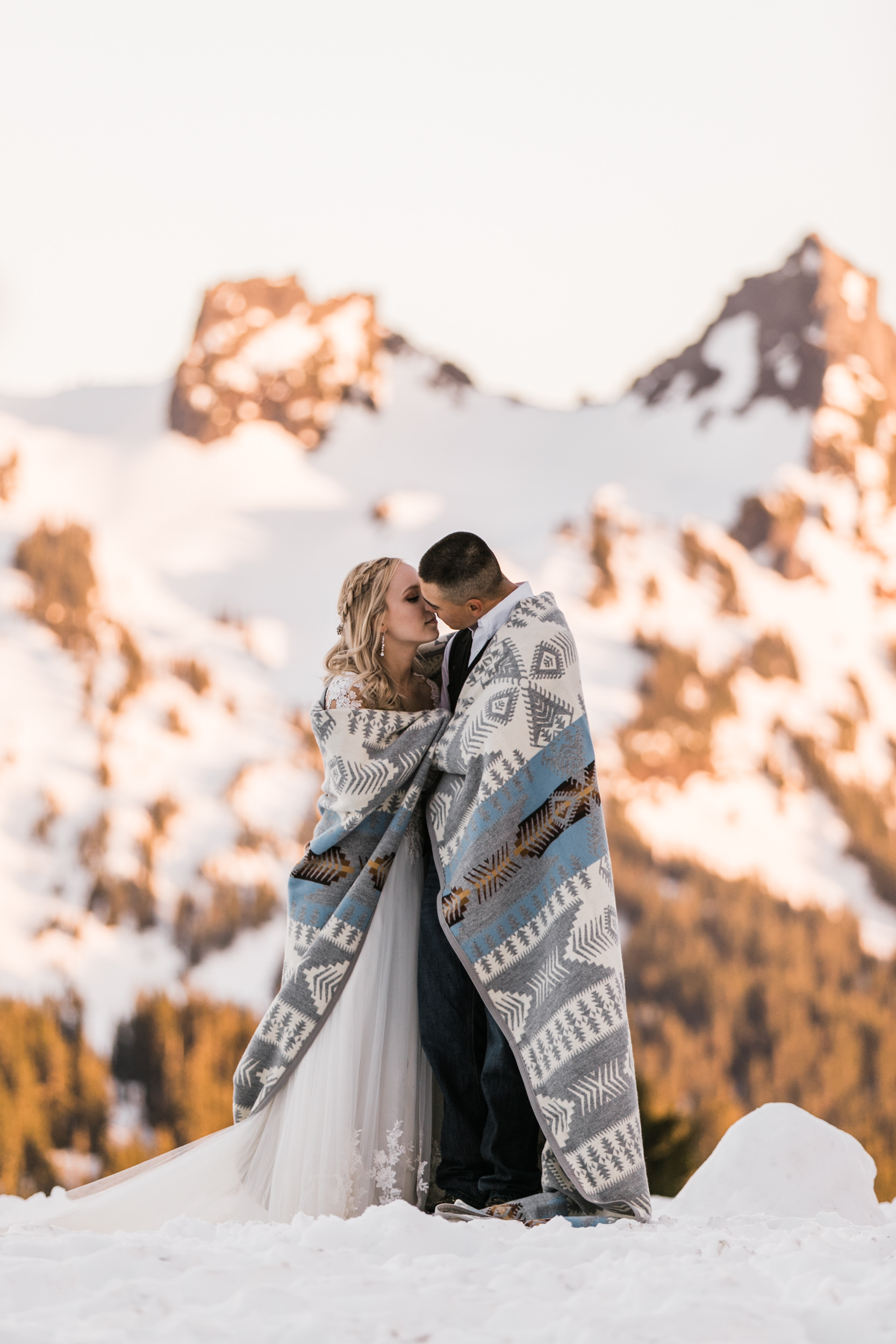 snowy wedding | long sleeve wedding dress | pendleton silver bark wedding blanket | wedding portraits in the snow in mount rainier | first dance in the mountains | national park elopement photographer