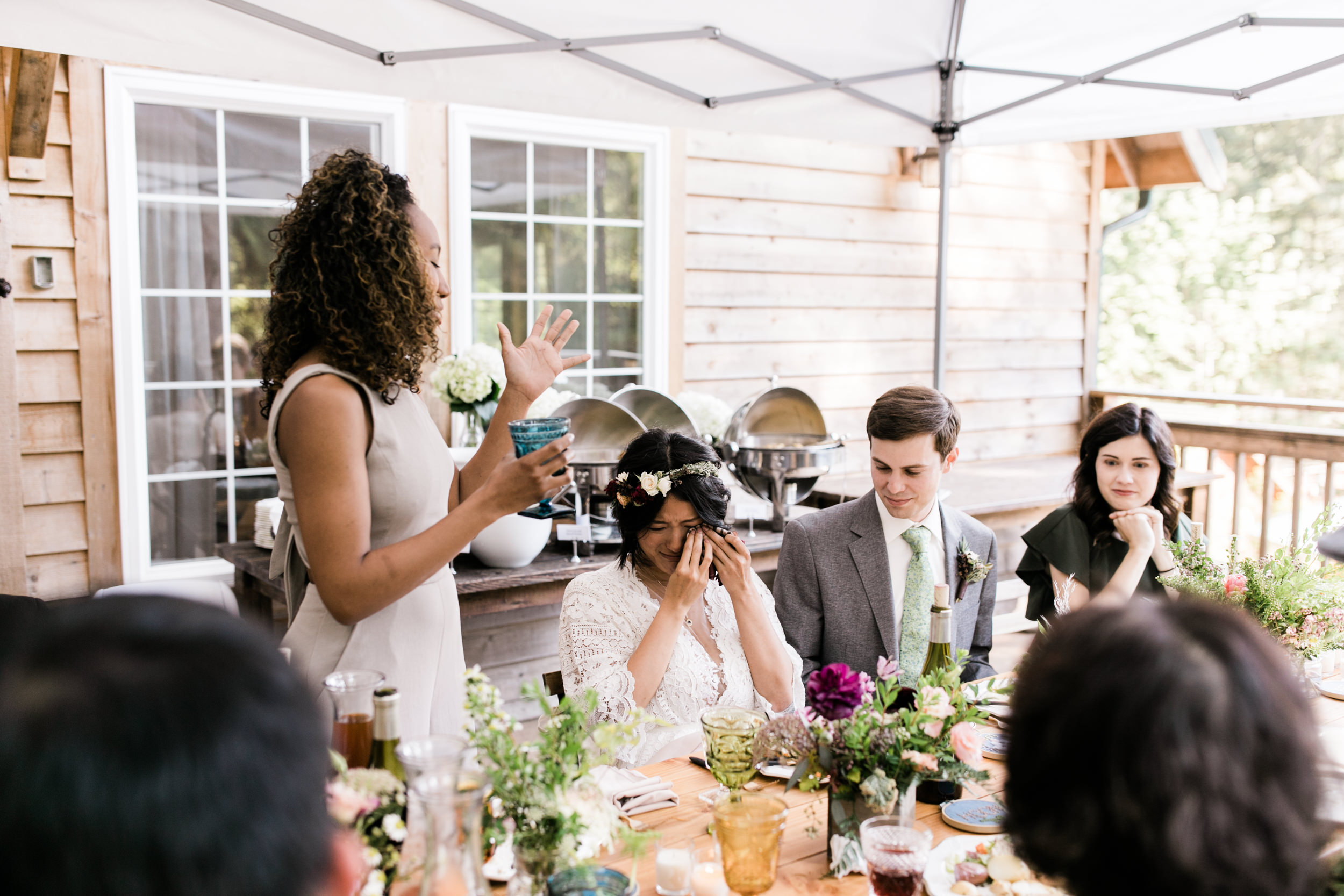 intimate wedding and reception in mount rainier national park | a frame cabin elopement first look | woodsy small reception in washington | snowy wedding portraits | elopement in the mountains