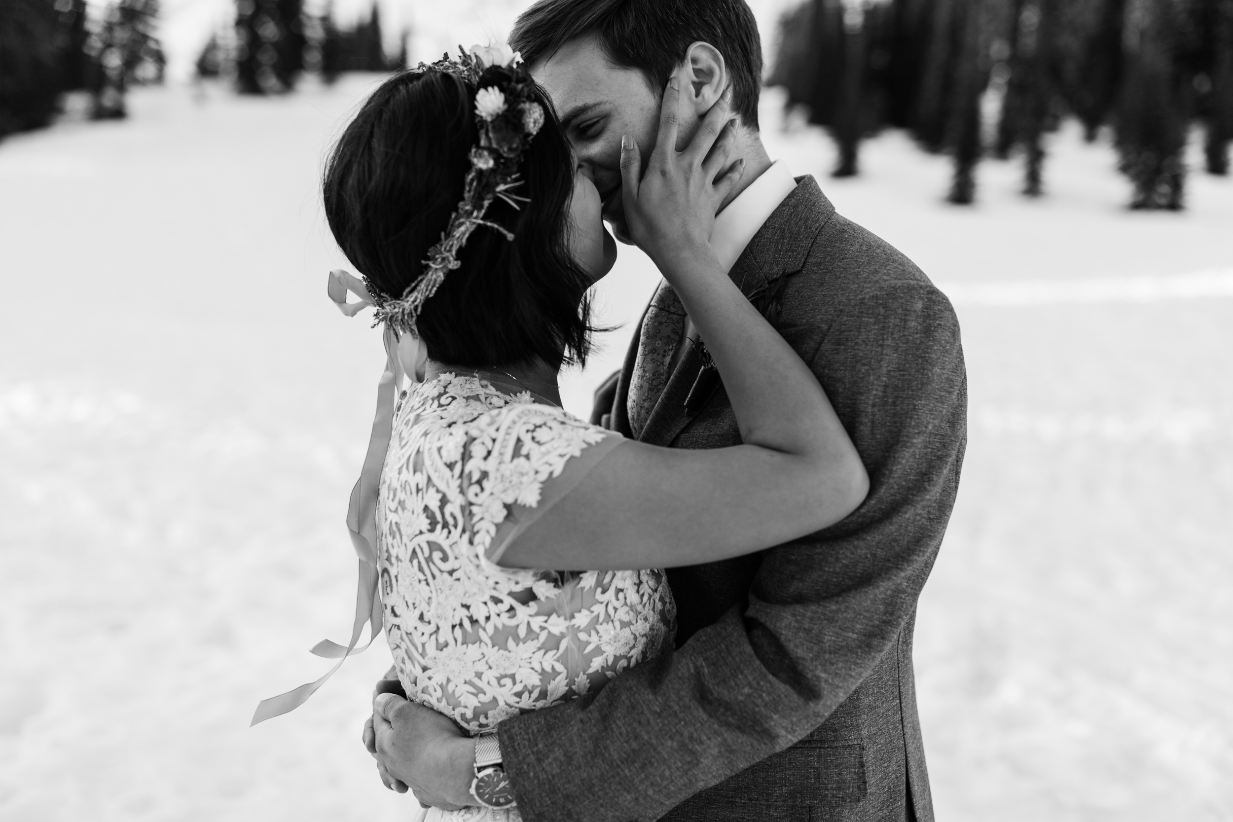 intimate wedding and reception in mount rainier national park | a frame cabin elopement first look | woodsy small reception in washington | snowy wedding portraits | elopement in the mountains