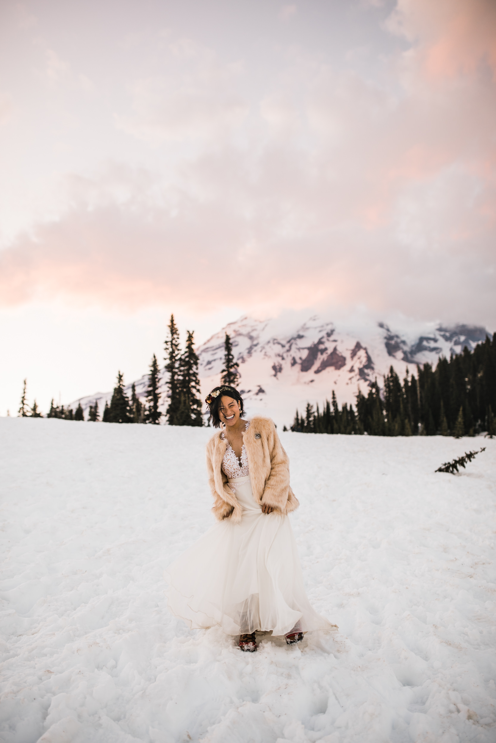 intimate wedding and reception in mount rainier national park | a frame cabin elopement first look | woodsy small reception in washington | snowy wedding portraits | elopement in the mountains