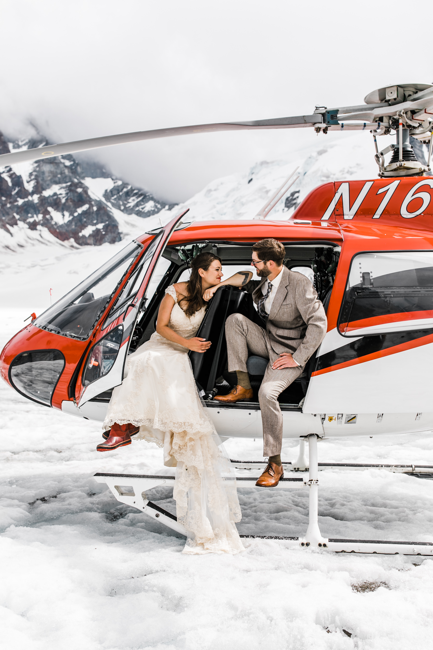 helicopter flightseeing tour in denali national park | alaska destination elopement inspiration | heli wedding in alaska | the hearnes adventure photography | www.thehearnes.com