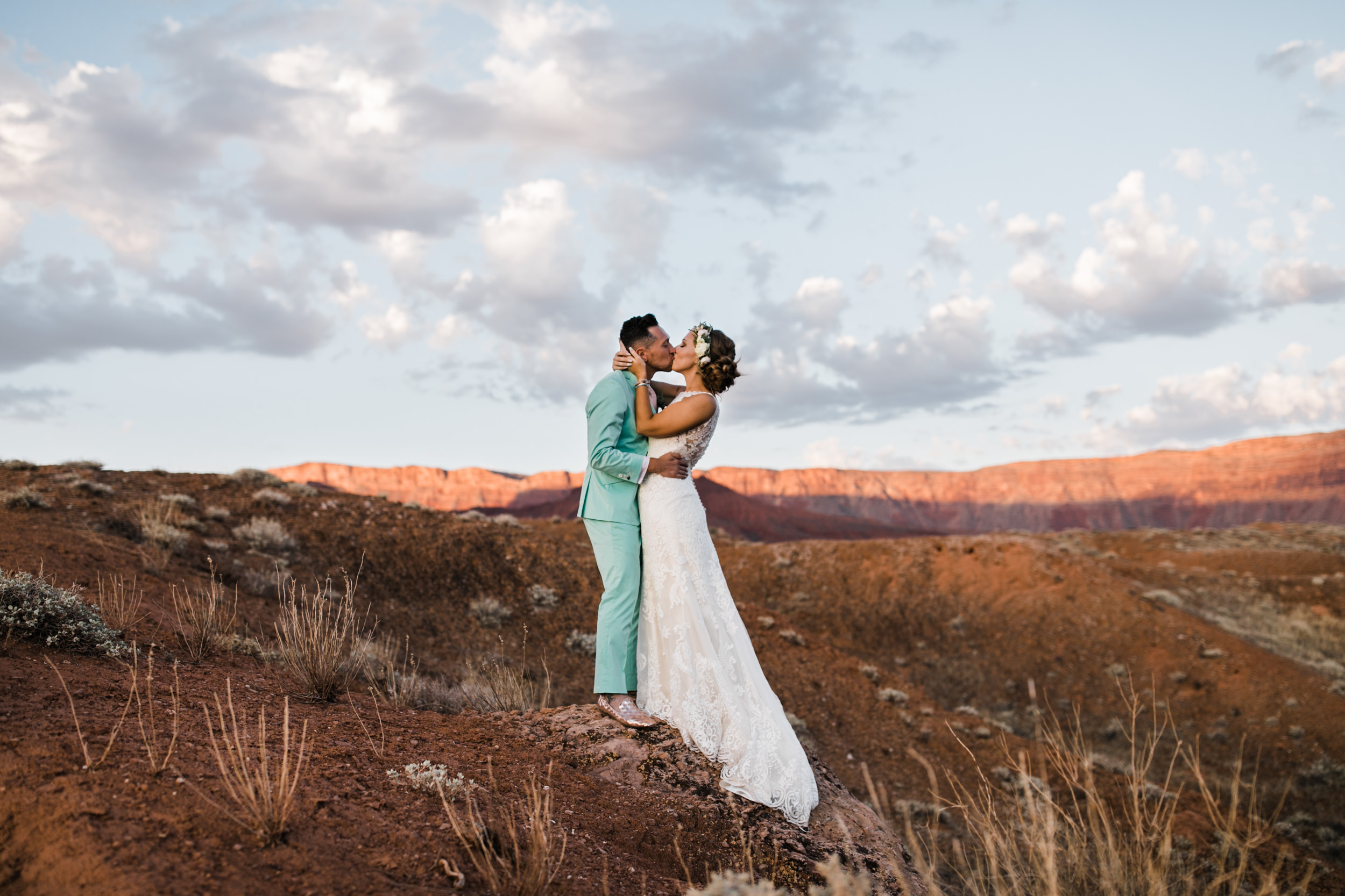 sunrise adventure wedding session | moab, utah elopement photographer | desert wedding inspiration | blue tux | mint colored suit | unique groom | the hearnes adventure photography