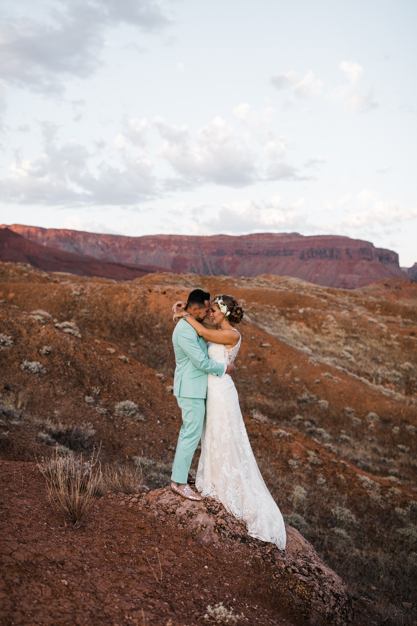 sunrise adventure wedding session | moab, utah elopement photographer | desert wedding inspiration | blue tux | mint colored suit | unique groom | the hearnes adventure photography