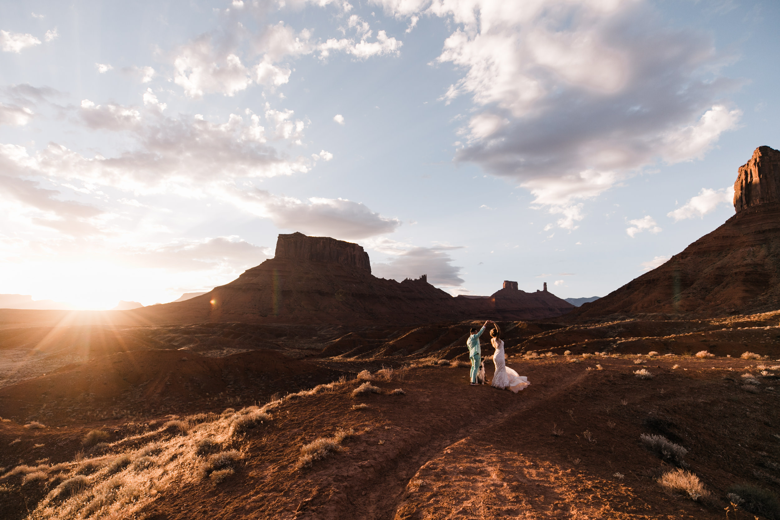 sunrise adventure wedding session | moab, utah elopement photographer | desert wedding inspiration | blue tux | mint colored suit | unique groom | the hearnes adventure photography