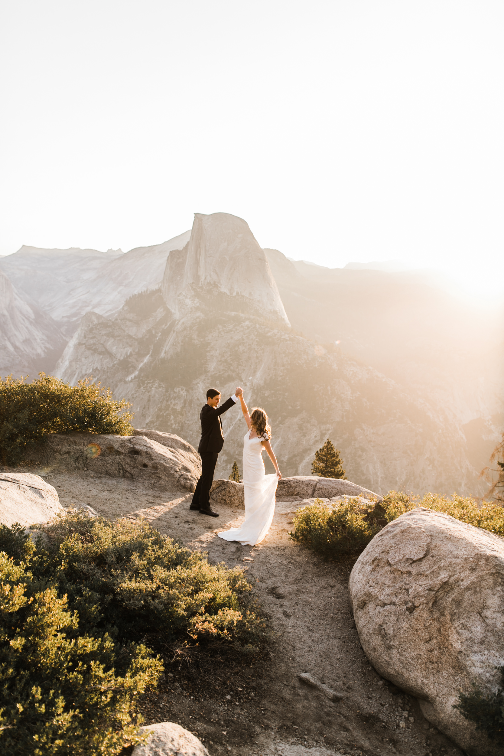 first look and wedding portraits at glacier point | bride and groom with a dog | yosemite national park elopement photographer | the hearnes adventure photography 