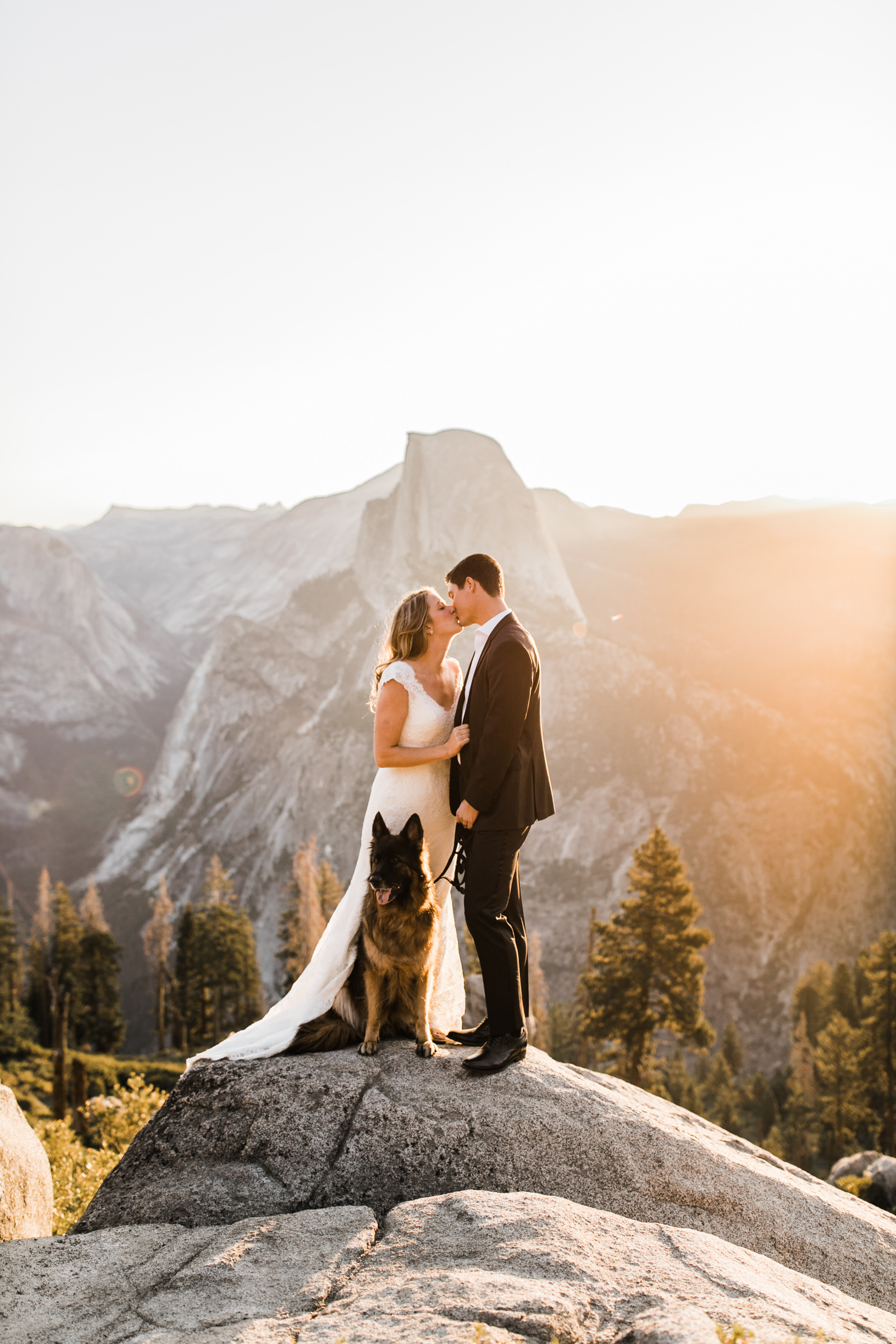 first look and wedding portraits at glacier point | bride and groom with a dog | yosemite national park elopement photographer | the hearnes adventure photography 